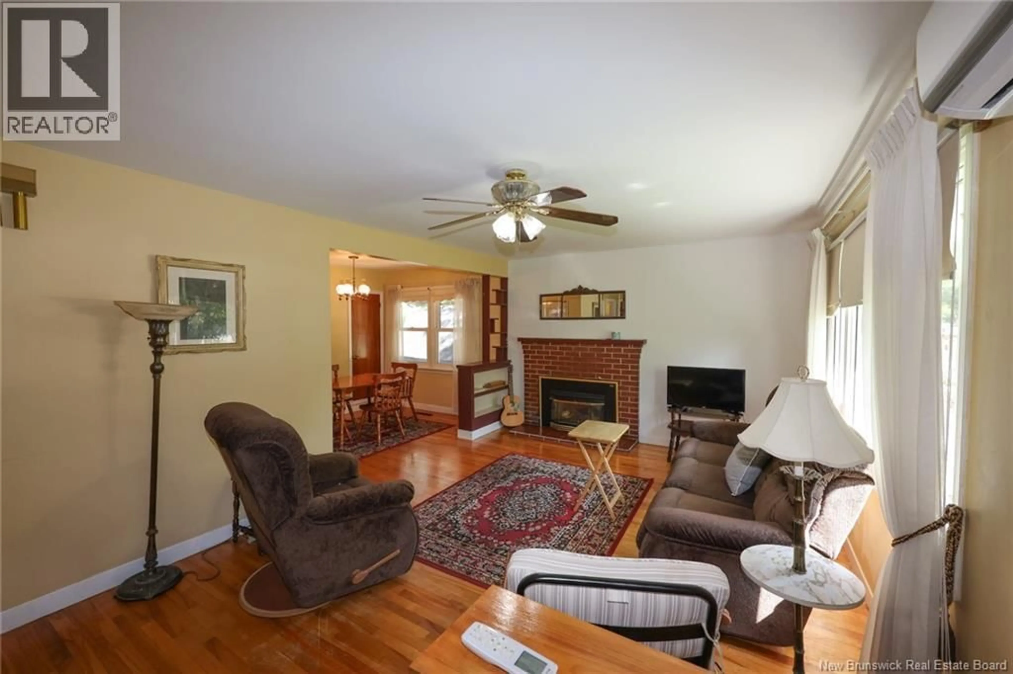 Living room with furniture, unknown for 229 FULTON AVENUE, Fredericton New Brunswick E3A2B7