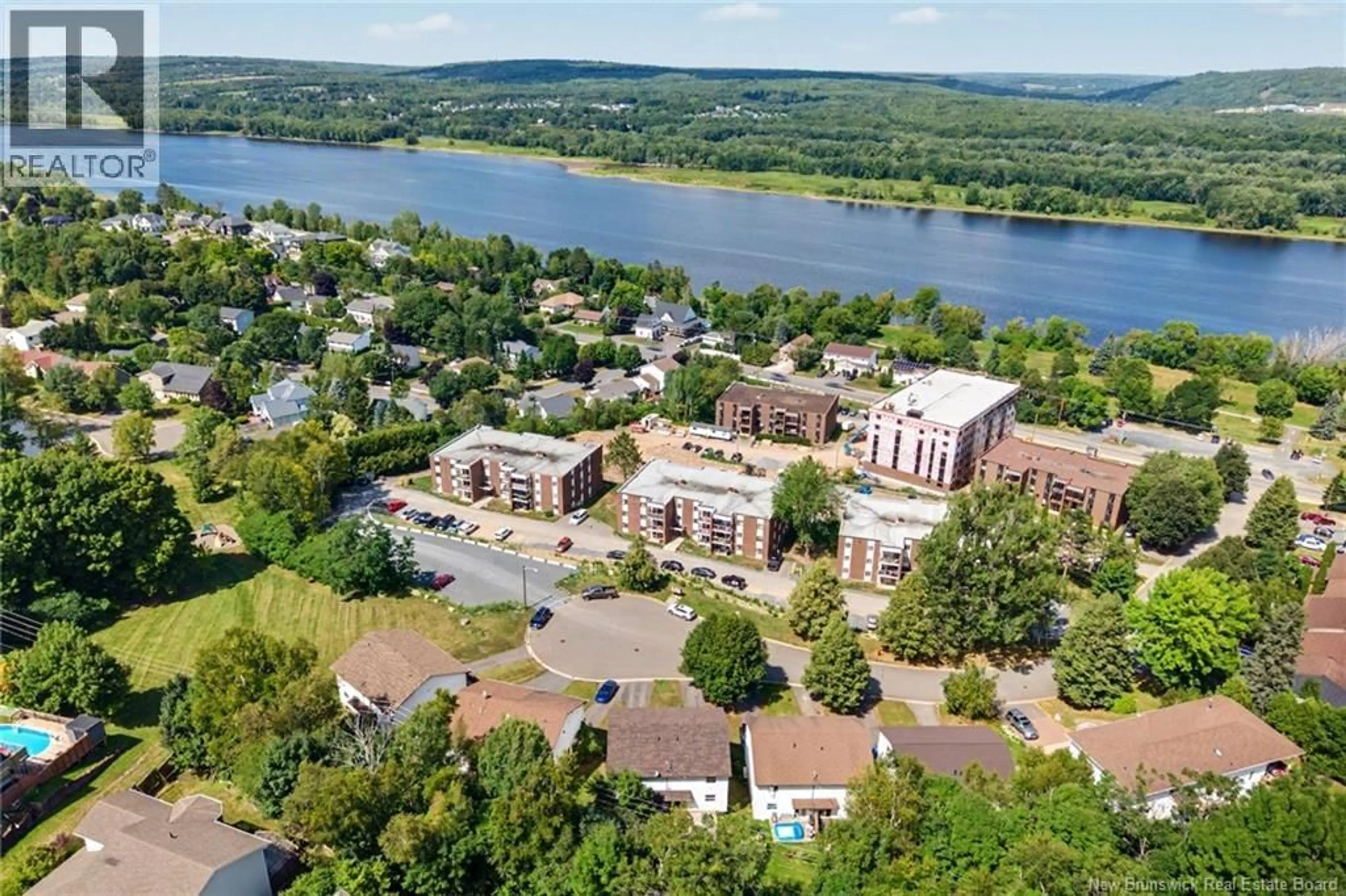 A pic from outside/outdoor area/front of a property/back of a property/a pic from drone, water/lake/river/ocean view for 76 ANGELVIEW COURT, Fredericton New Brunswick E3B7A8