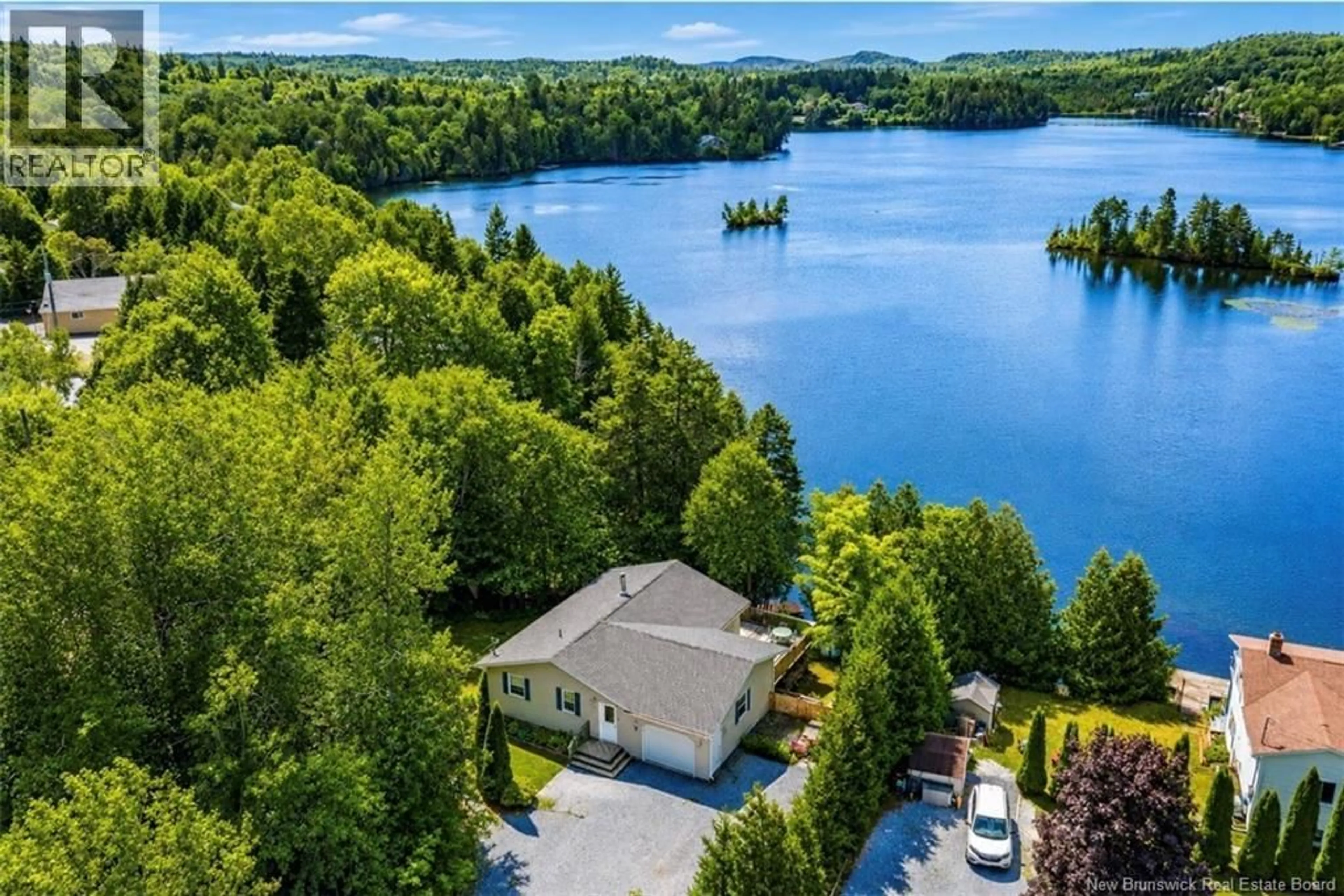 A pic from outside/outdoor area/front of a property/back of a property/a pic from drone, water/lake/river/ocean view for 3 WATERCREST ROAD, Rothesay New Brunswick E2S1B7