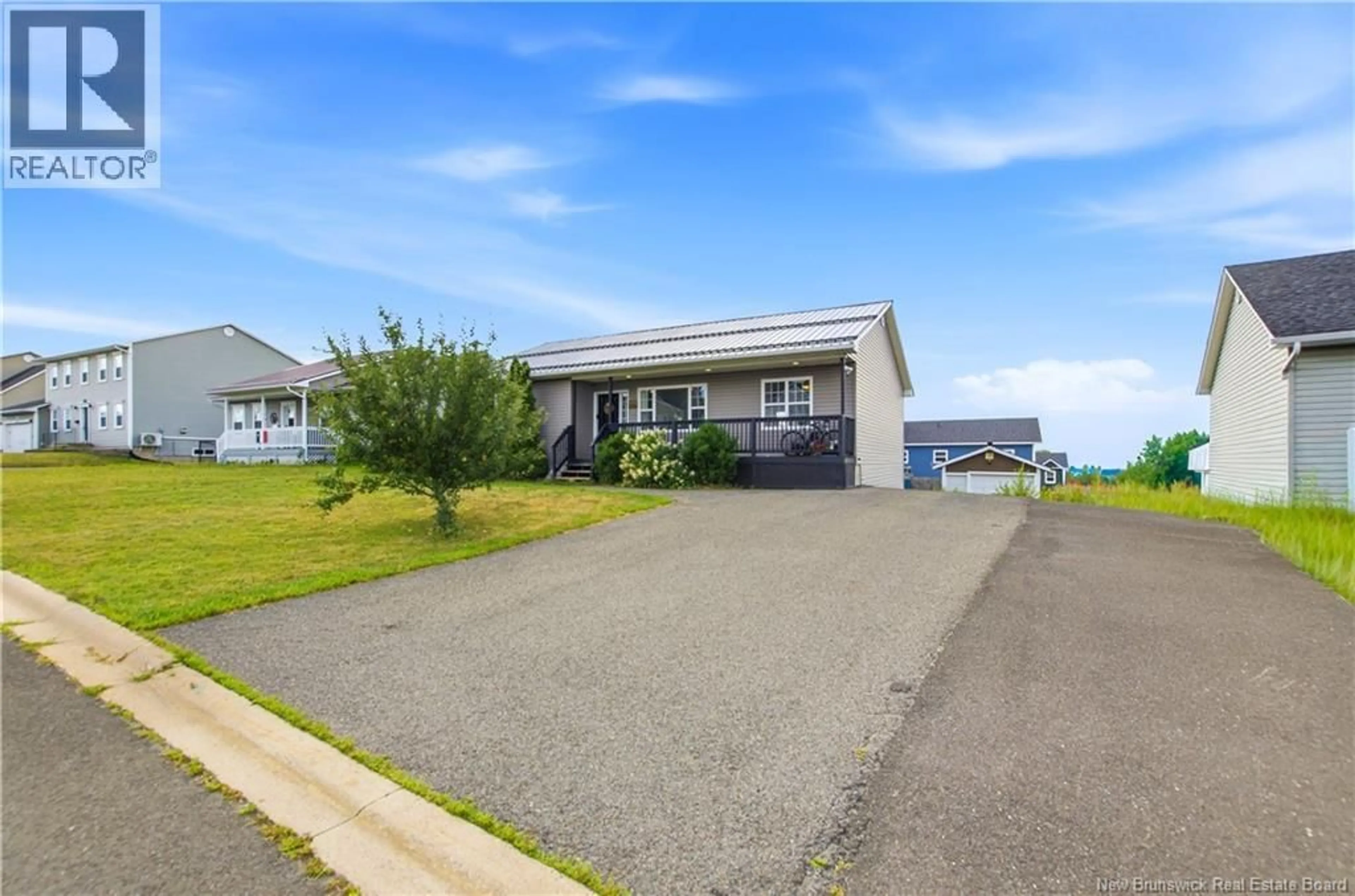 A pic from outside/outdoor area/front of a property/back of a property/a pic from drone, water/lake/river/ocean view for 16 KNOWLTON CRESCENT, Oromocto New Brunswick E2V4S8