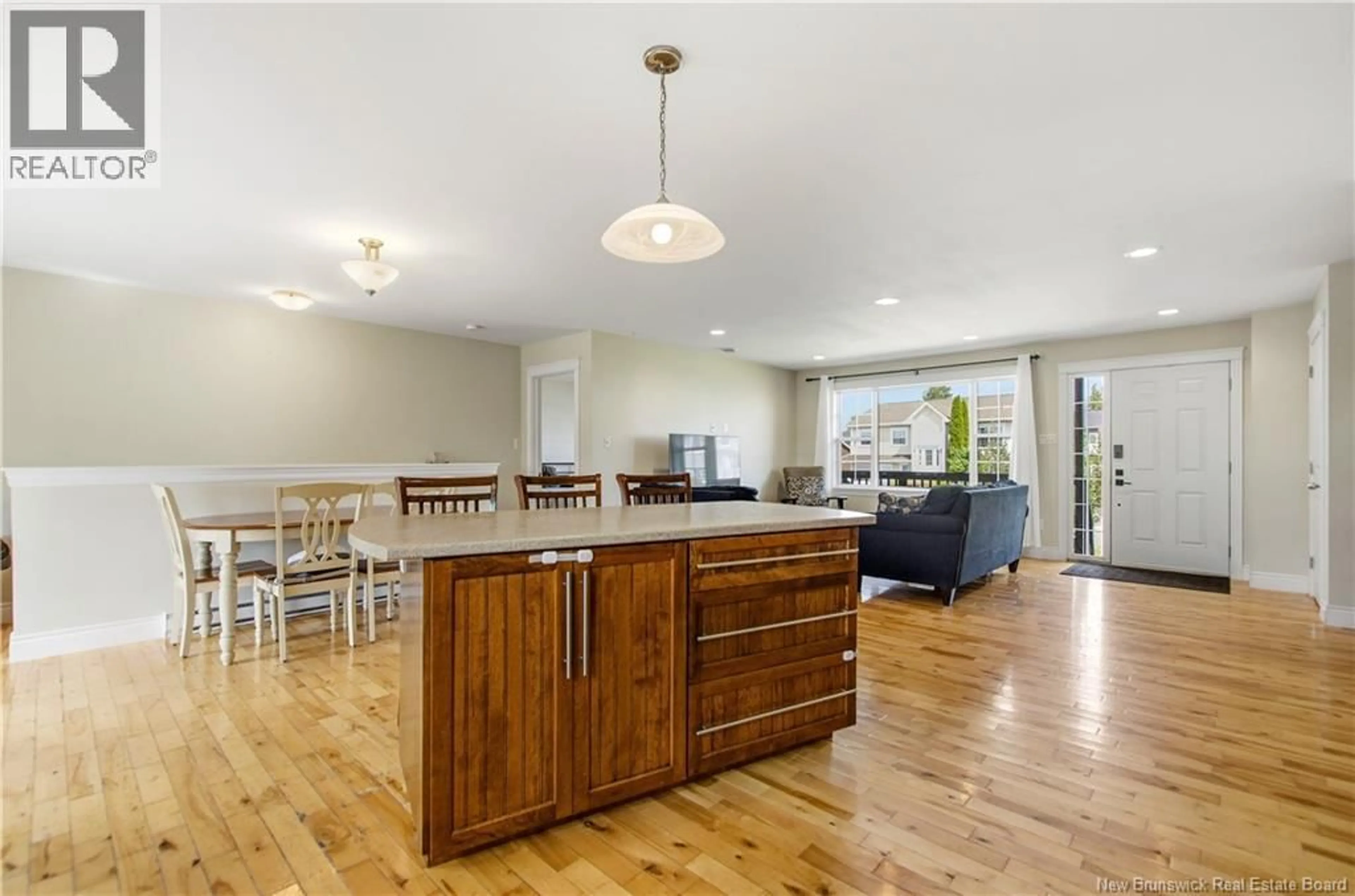 Open concept kitchen, wood/laminate floor for 16 KNOWLTON CRESCENT, Oromocto New Brunswick E2V4S8