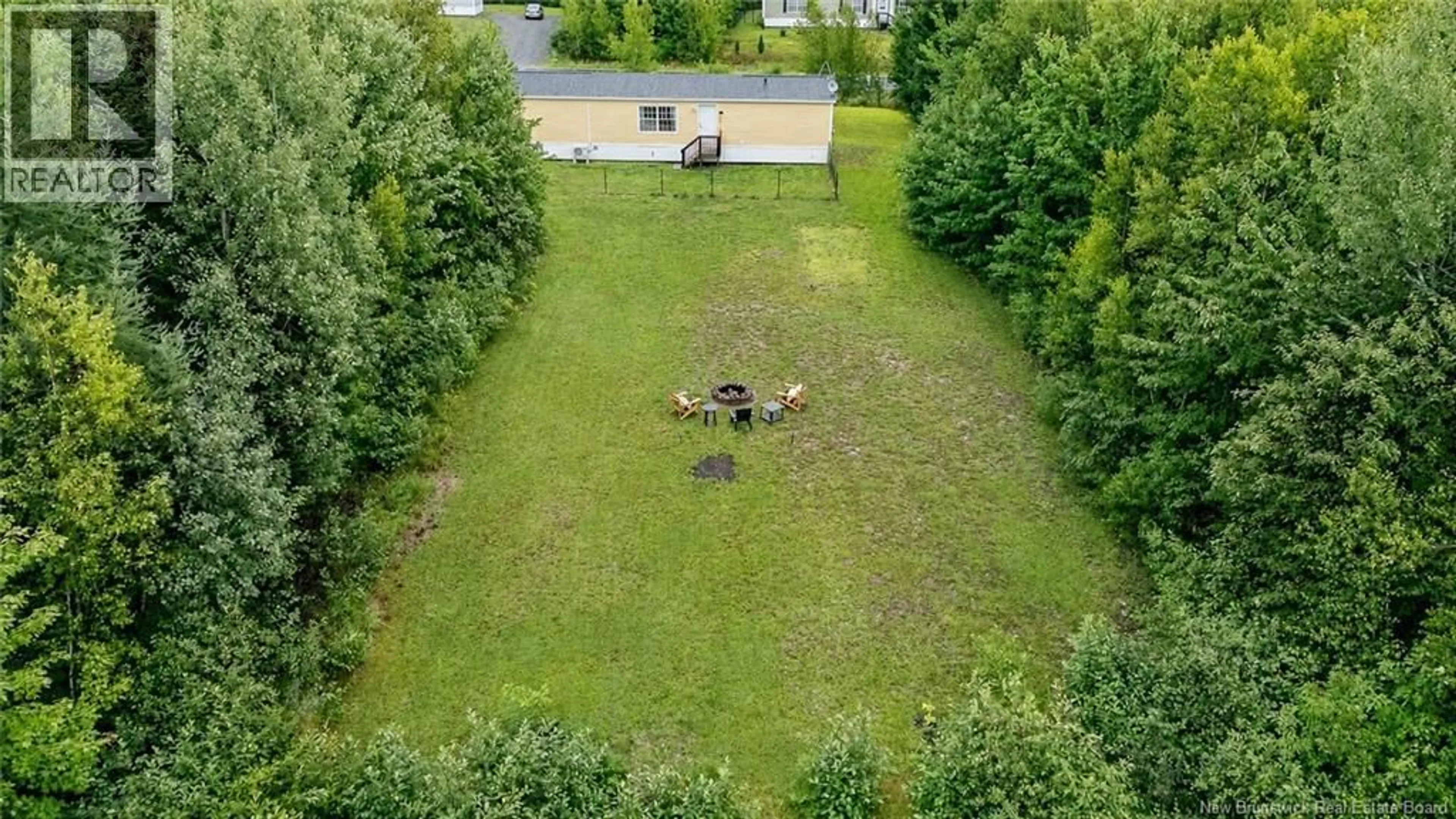 A pic from outside/outdoor area/front of a property/back of a property/a pic from drone, forest/trees view for 66 CARRIE STREET, Rusagonis New Brunswick E3B0T2