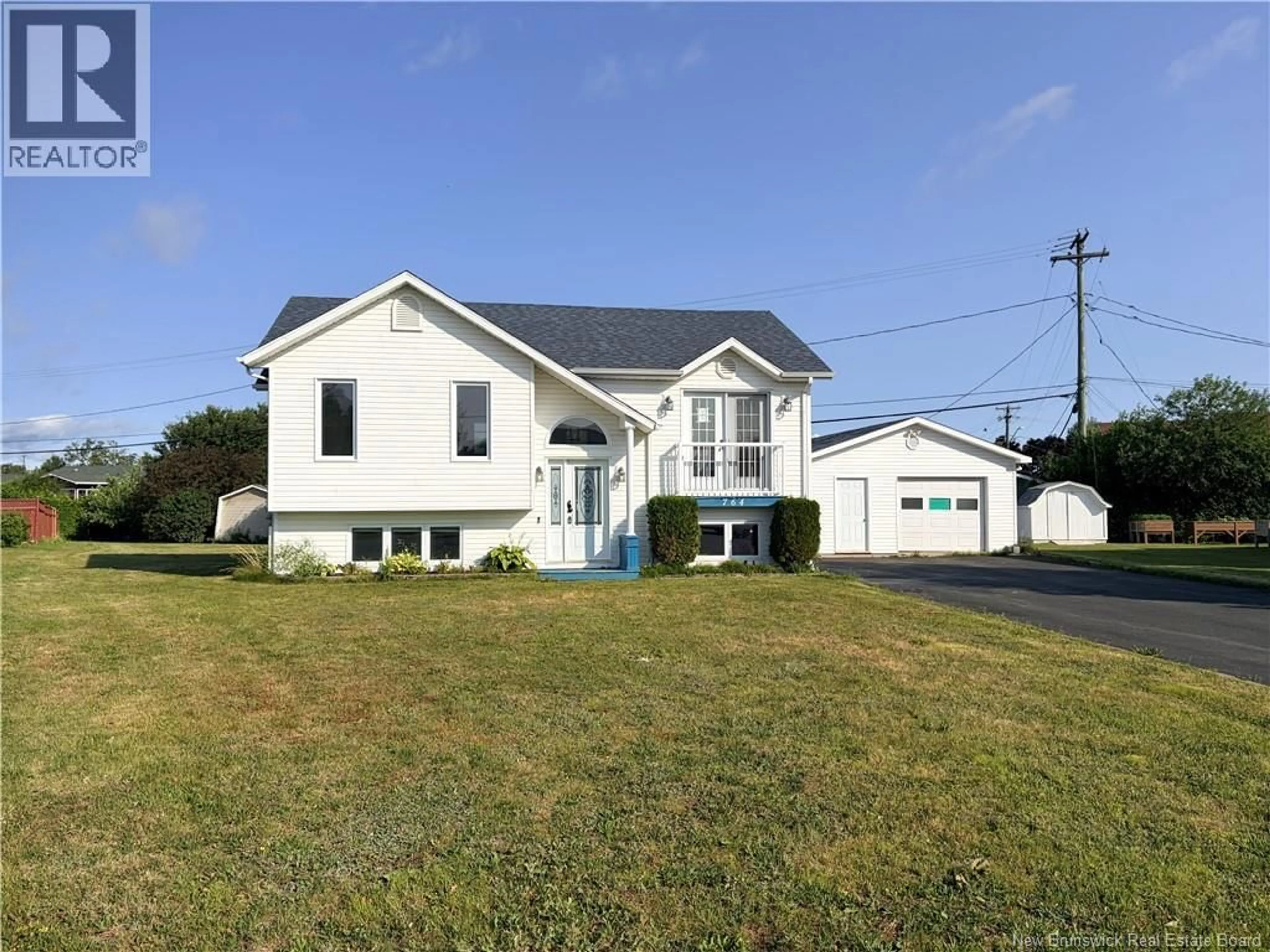 Home with vinyl exterior material, street for 764 RUE CHAMPLAIN STREET, Beresford New Brunswick E8K1R9