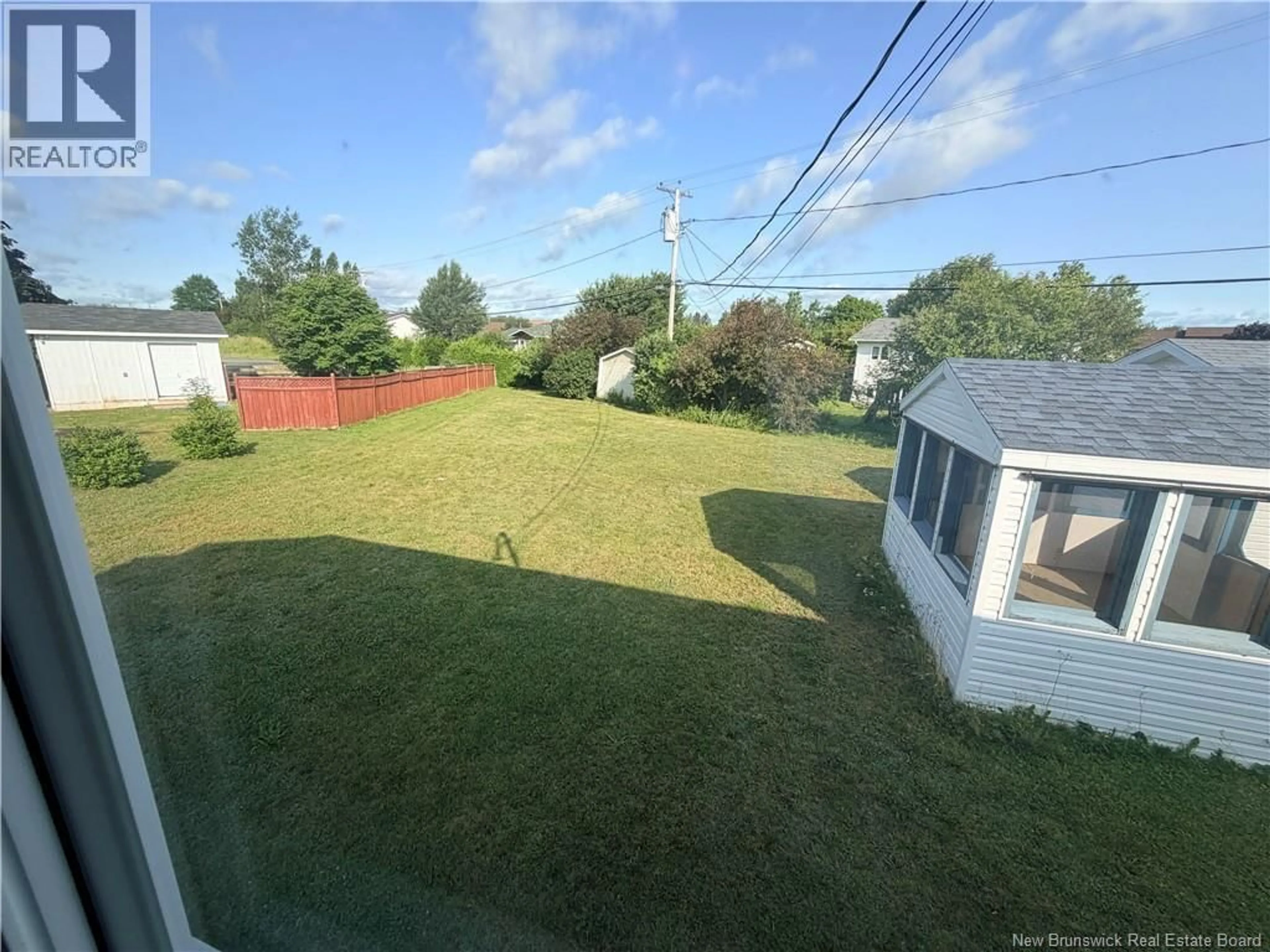 A pic from outside/outdoor area/front of a property/back of a property/a pic from drone, mountain view for 764 RUE CHAMPLAIN STREET, Beresford New Brunswick E8K1R9