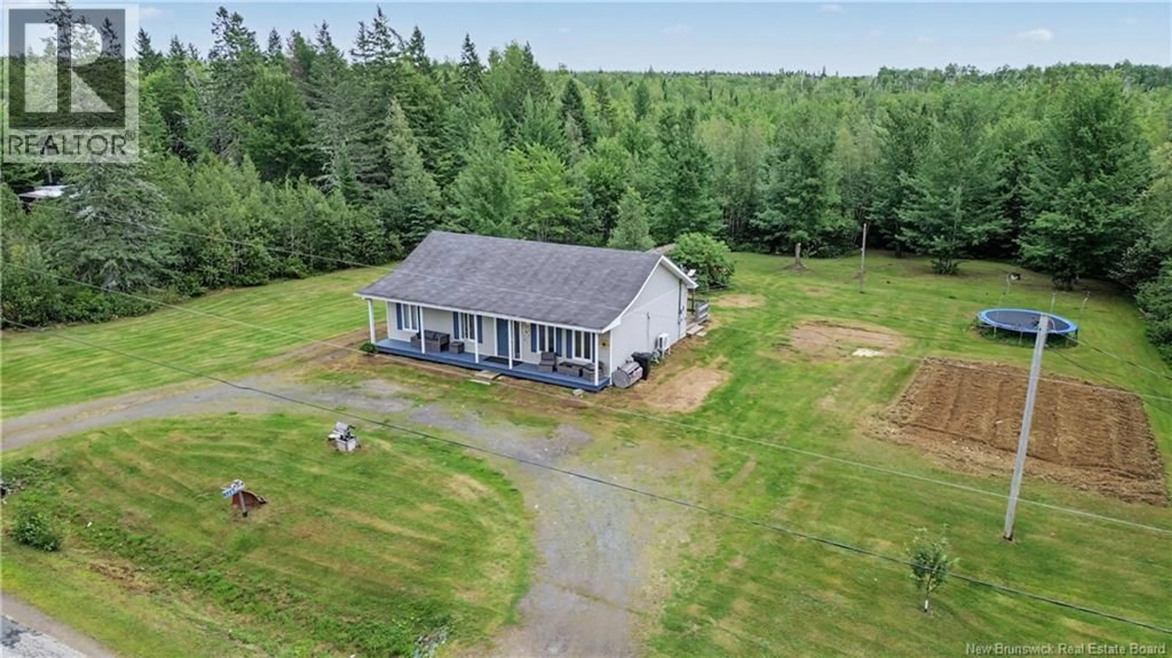 A pic from outside/outdoor area/front of a property/back of a property/a pic from drone, unknown for 138 SAINT PIERRE, Rogersville New Brunswick E4Y1L5