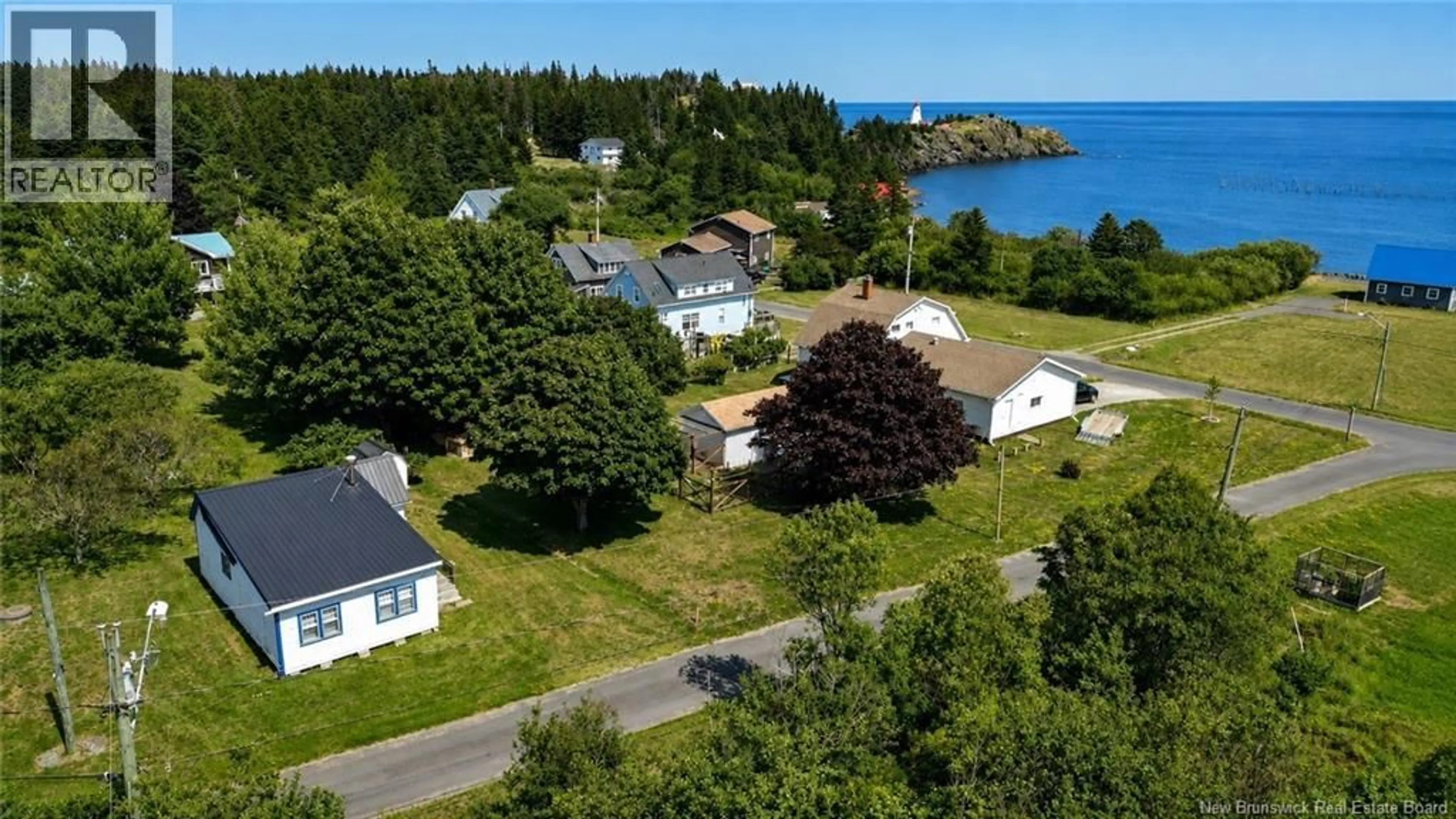 A pic from outside/outdoor area/front of a property/back of a property/a pic from drone, water/lake/river/ocean view for 6 FERN STREET, Grand Manan New Brunswick E5G2A6