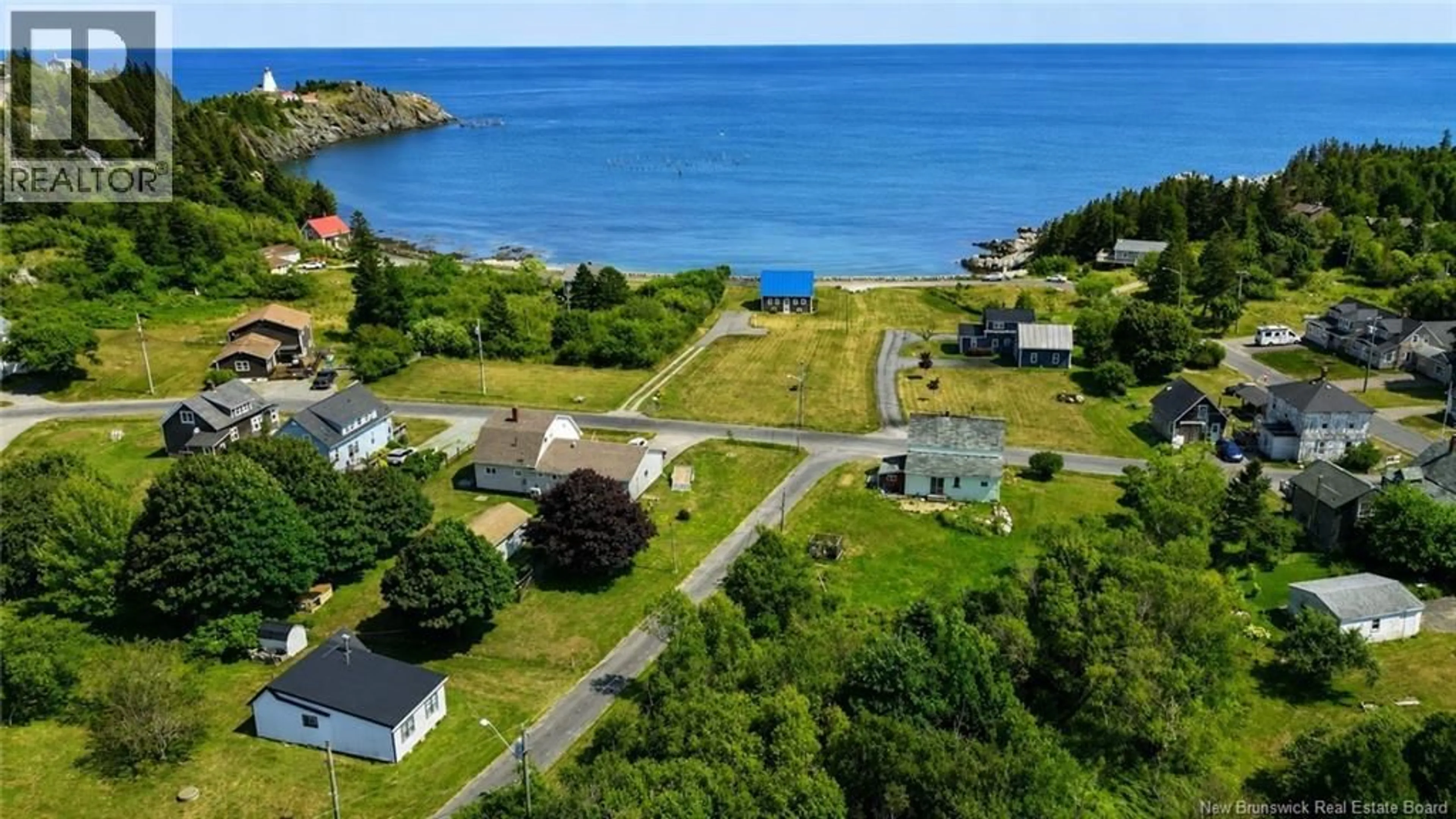 A pic from outside/outdoor area/front of a property/back of a property/a pic from drone, water/lake/river/ocean view for 6 FERN STREET, Grand Manan New Brunswick E5G2A6
