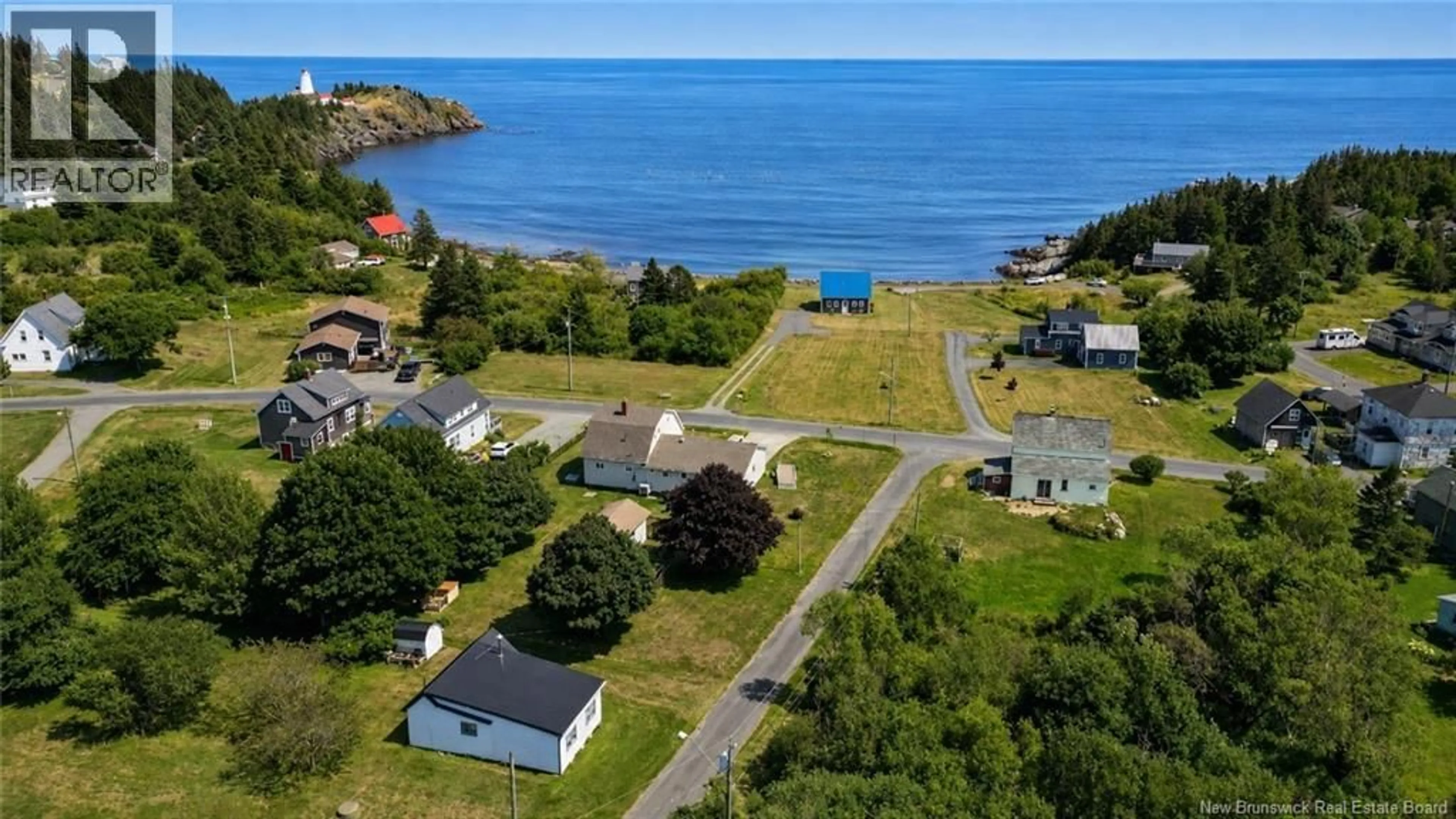 A pic from outside/outdoor area/front of a property/back of a property/a pic from drone, water/lake/river/ocean view for 6 FERN STREET, Grand Manan New Brunswick E5G2A6