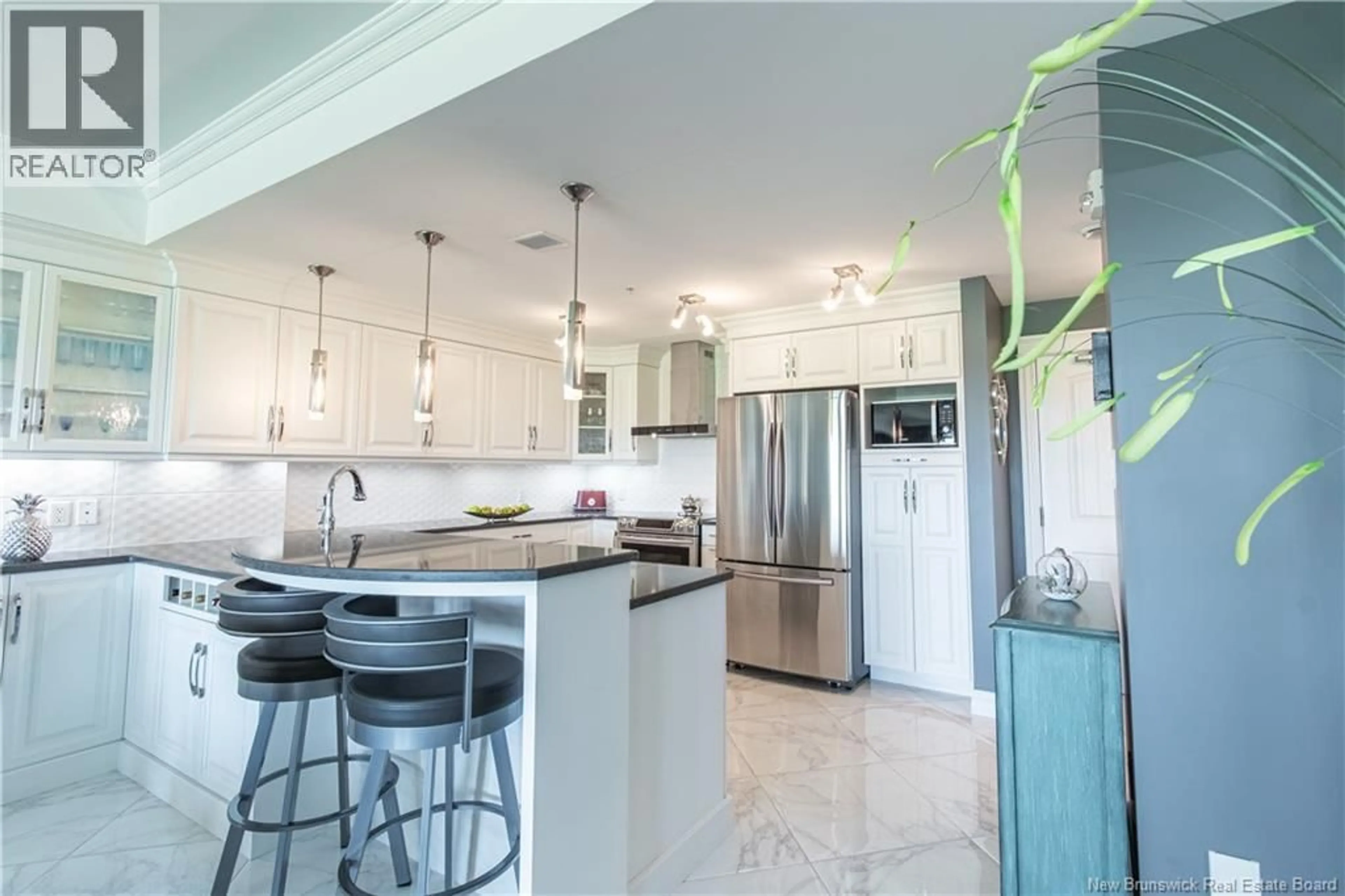 Open concept kitchen, ceramic/tile floor for 204 - 185 ROYAL OAKS BOULEVARD, Moncton New Brunswick E1H2P7