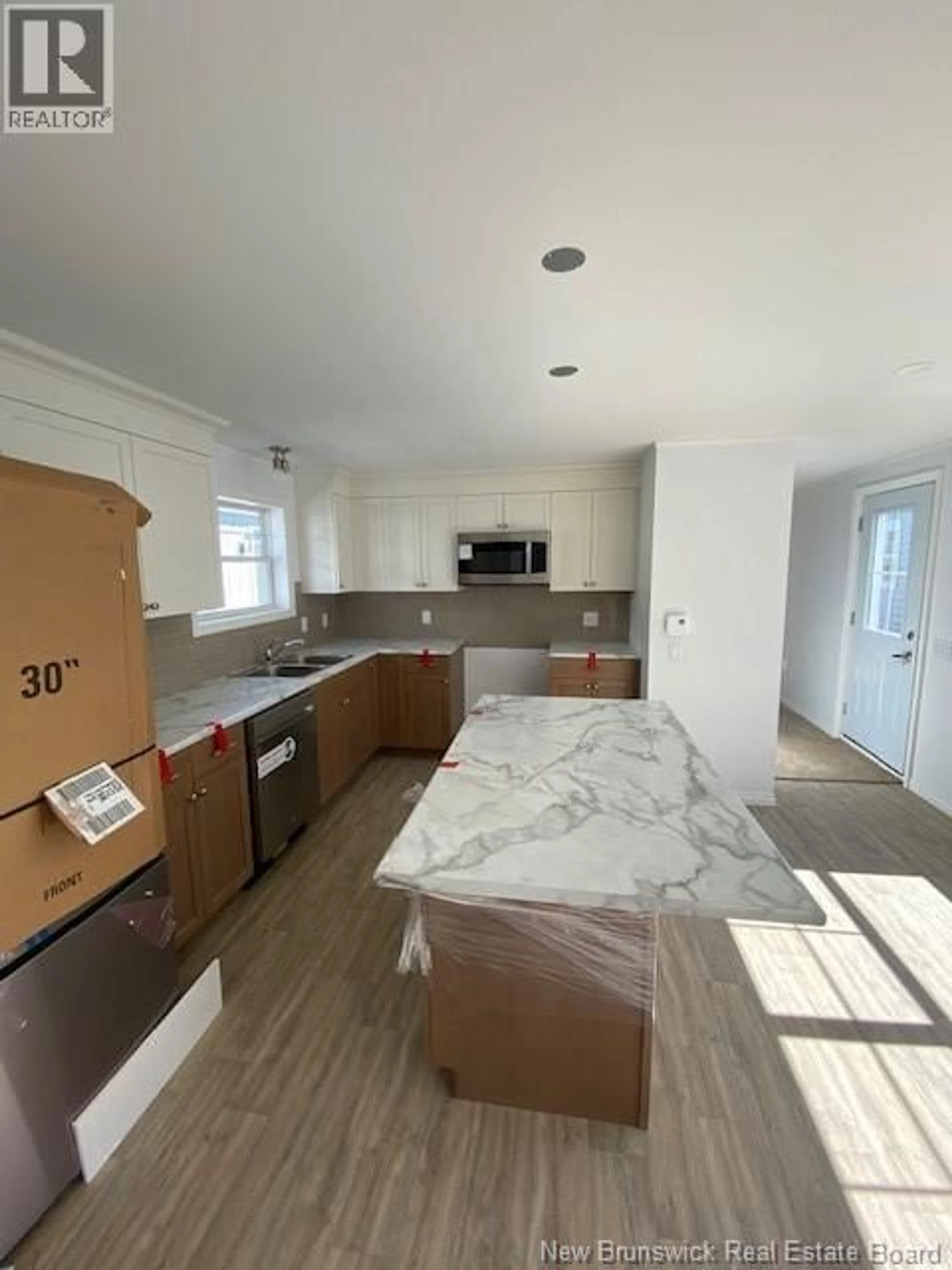 Open concept kitchen, unknown for 50 ULYSSE DRIVE, Dieppe New Brunswick E1A7C1