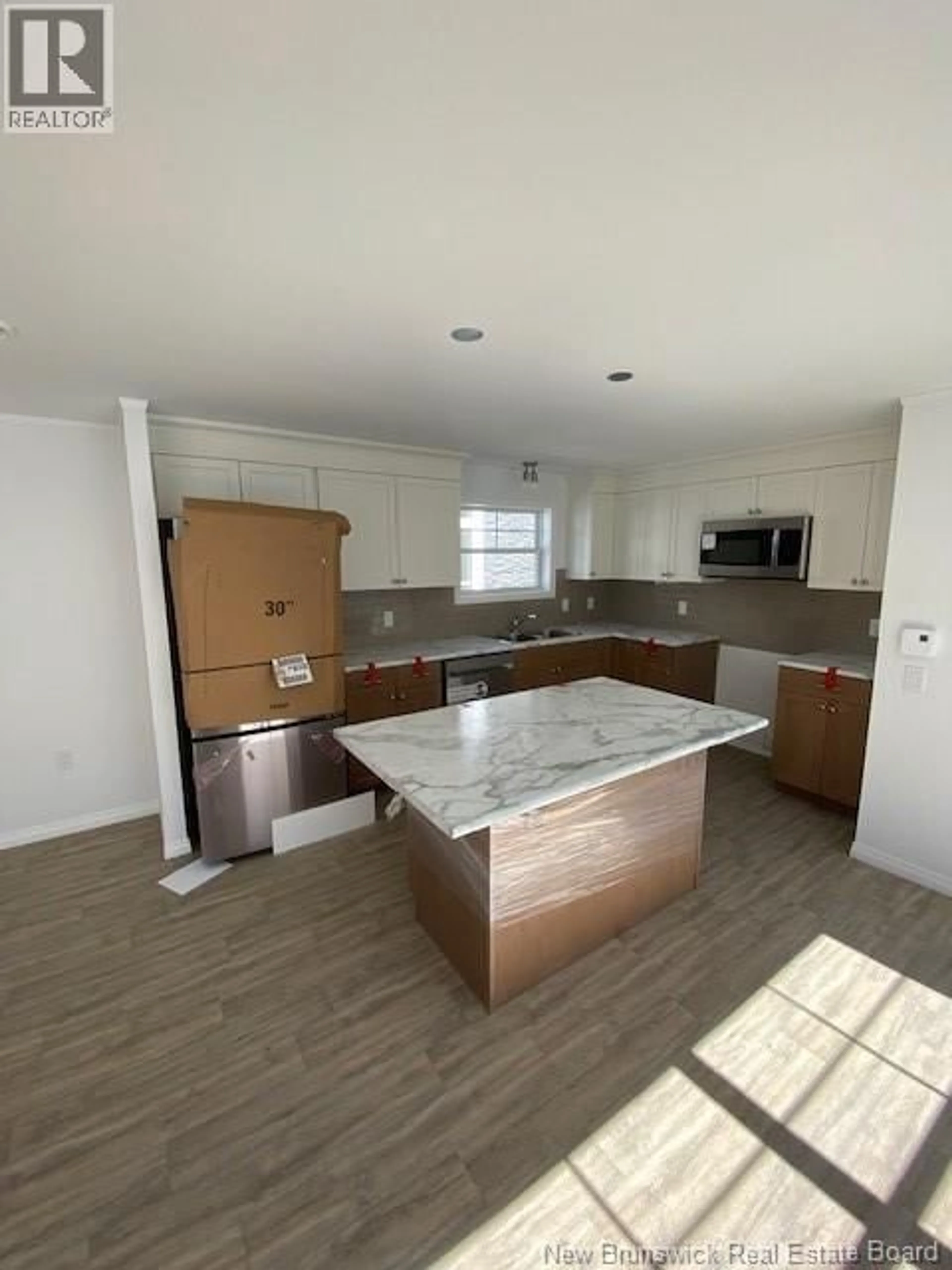 Open concept kitchen, unknown for 50 ULYSSE DRIVE, Dieppe New Brunswick E1A7C1
