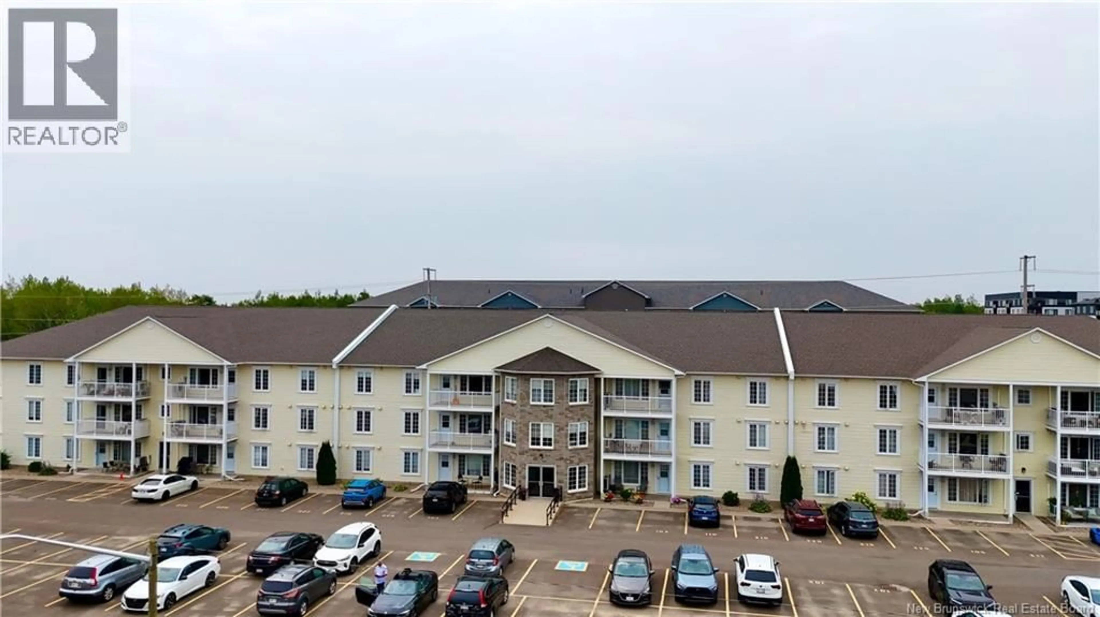 A pic from outside/outdoor area/front of a property/back of a property/a pic from drone, building for 327 - 130 LIAN STREET, Fredericton New Brunswick E3C0G4