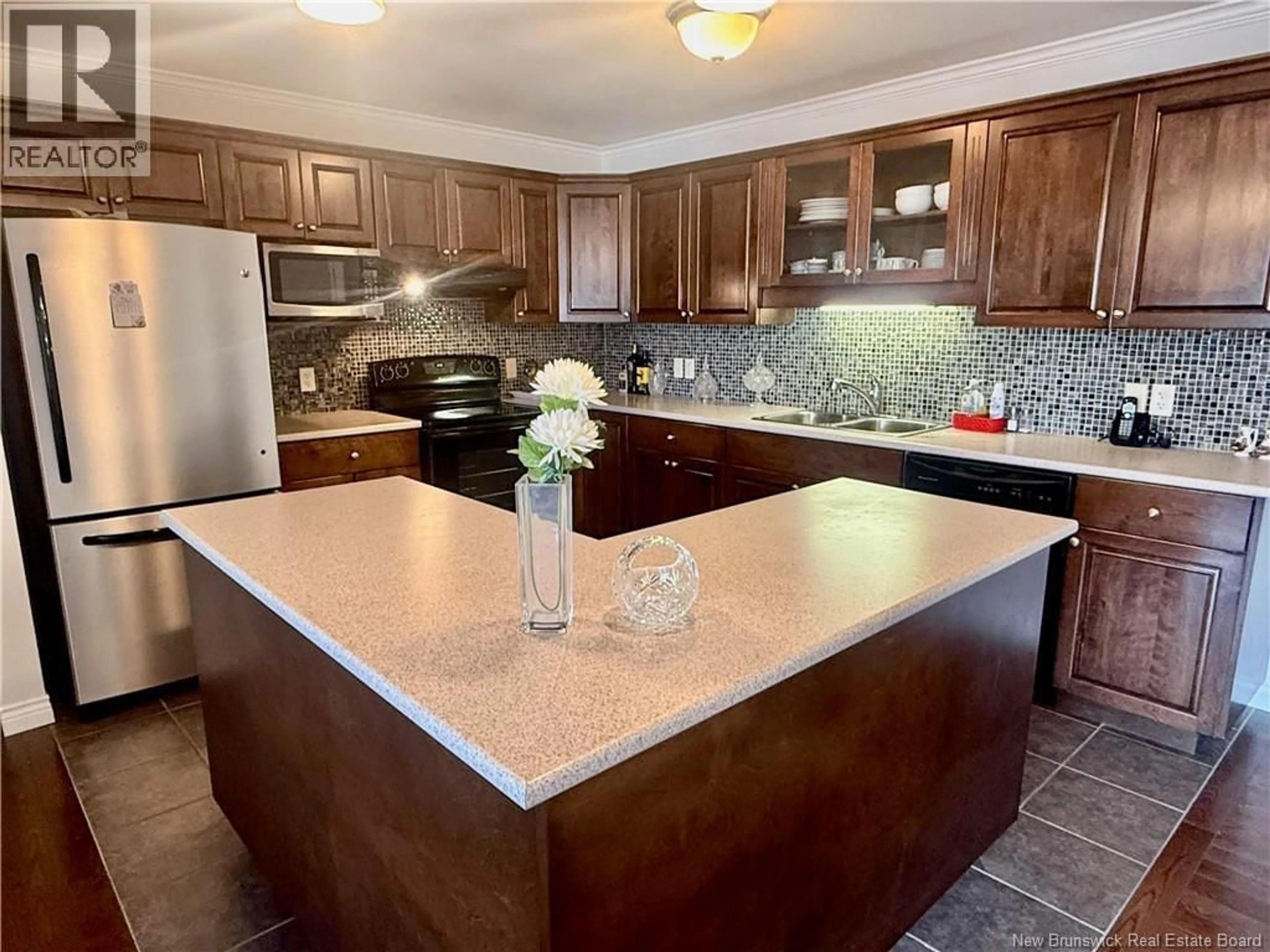 Open concept kitchen, ceramic/tile floor for 327 - 130 LIAN STREET, Fredericton New Brunswick E3C0G4