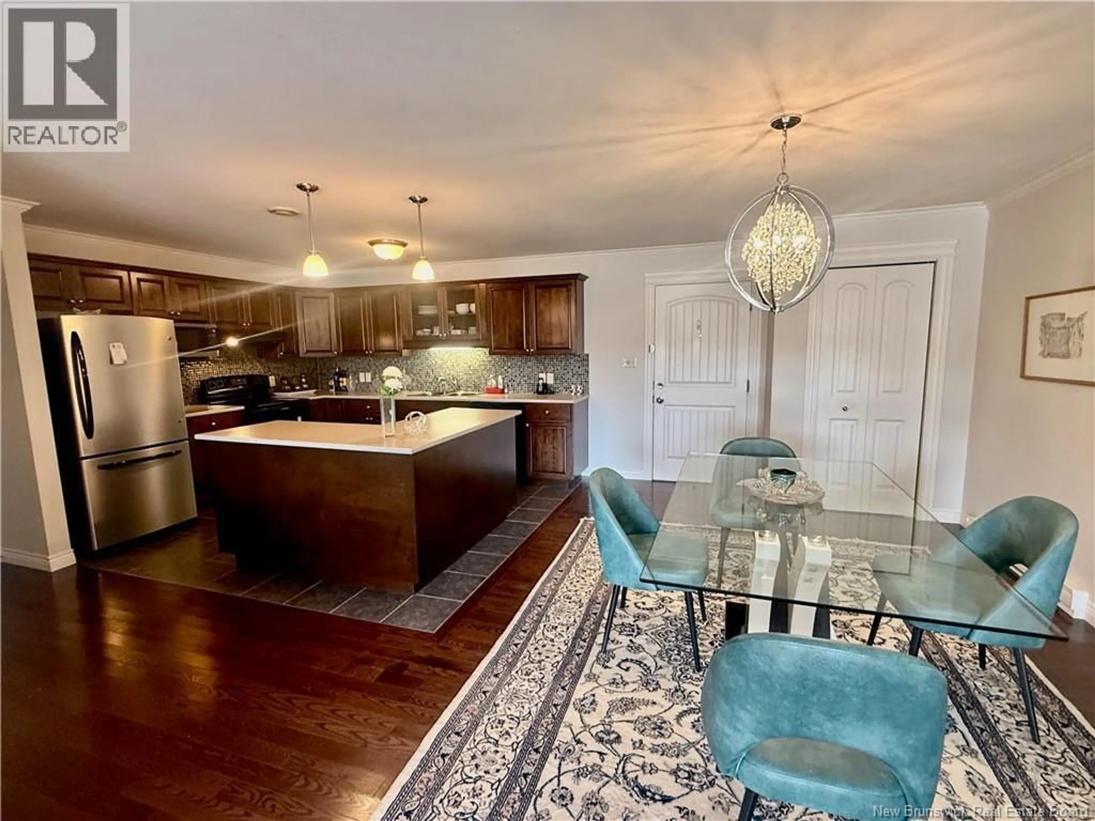 Open concept kitchen, wood/laminate floor for 327 - 130 LIAN STREET, Fredericton New Brunswick E3C0G4