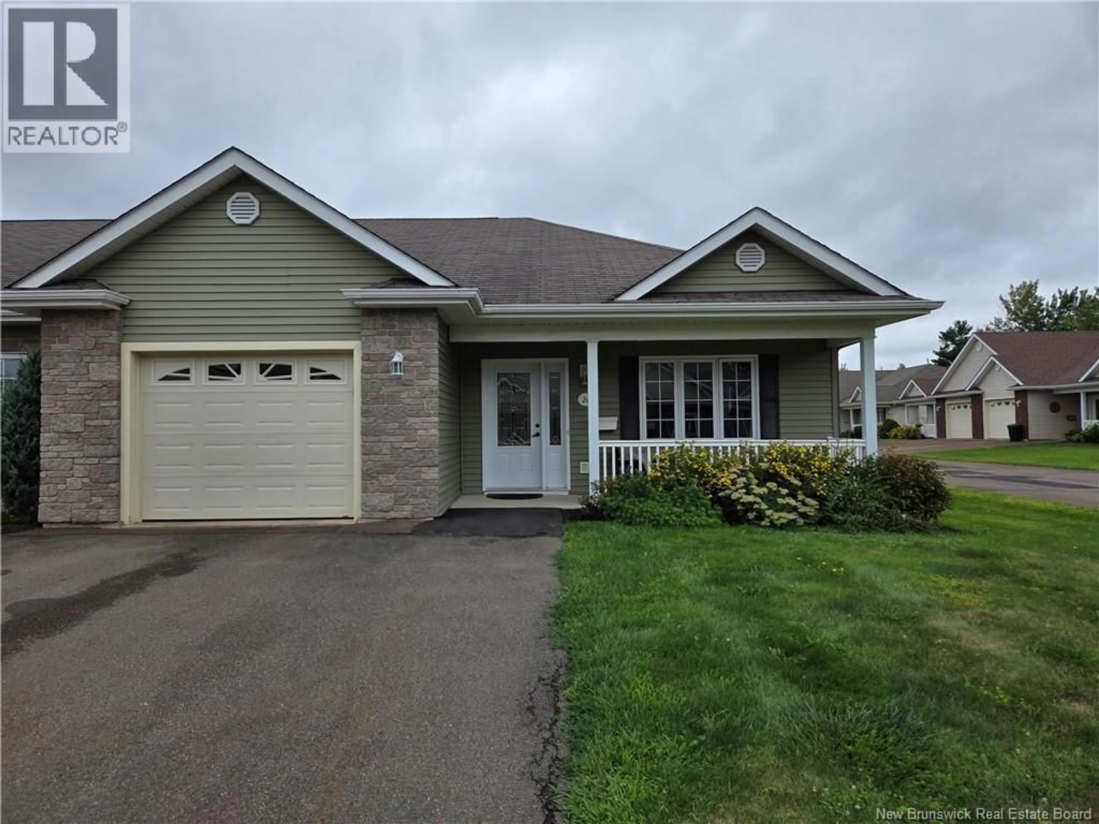 Home with vinyl exterior material, street for 26 ADELIE LANE, Moncton New Brunswick E1A0N4