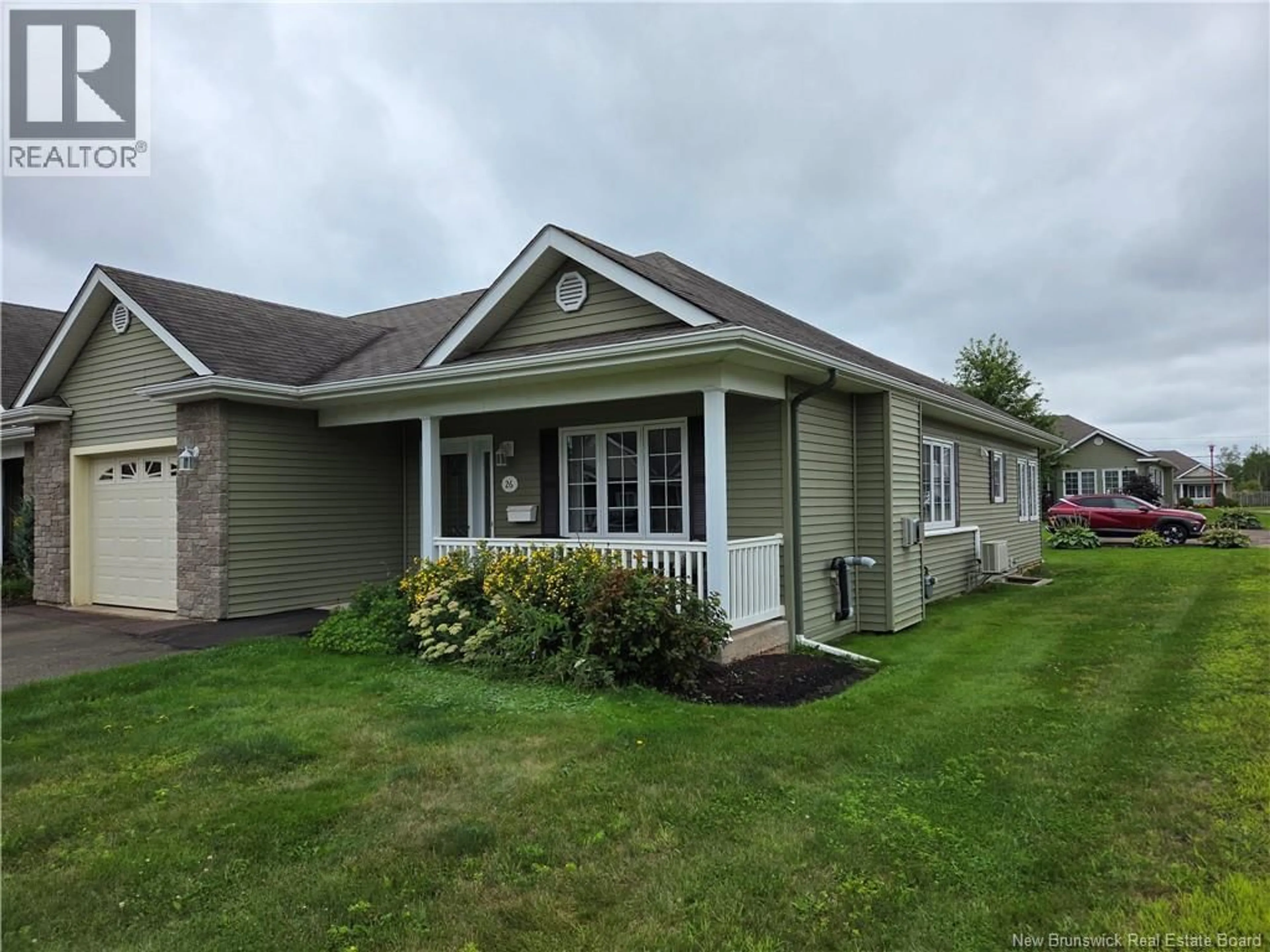 Home with vinyl exterior material, street for 26 ADELIE LANE, Moncton New Brunswick E1A0N4