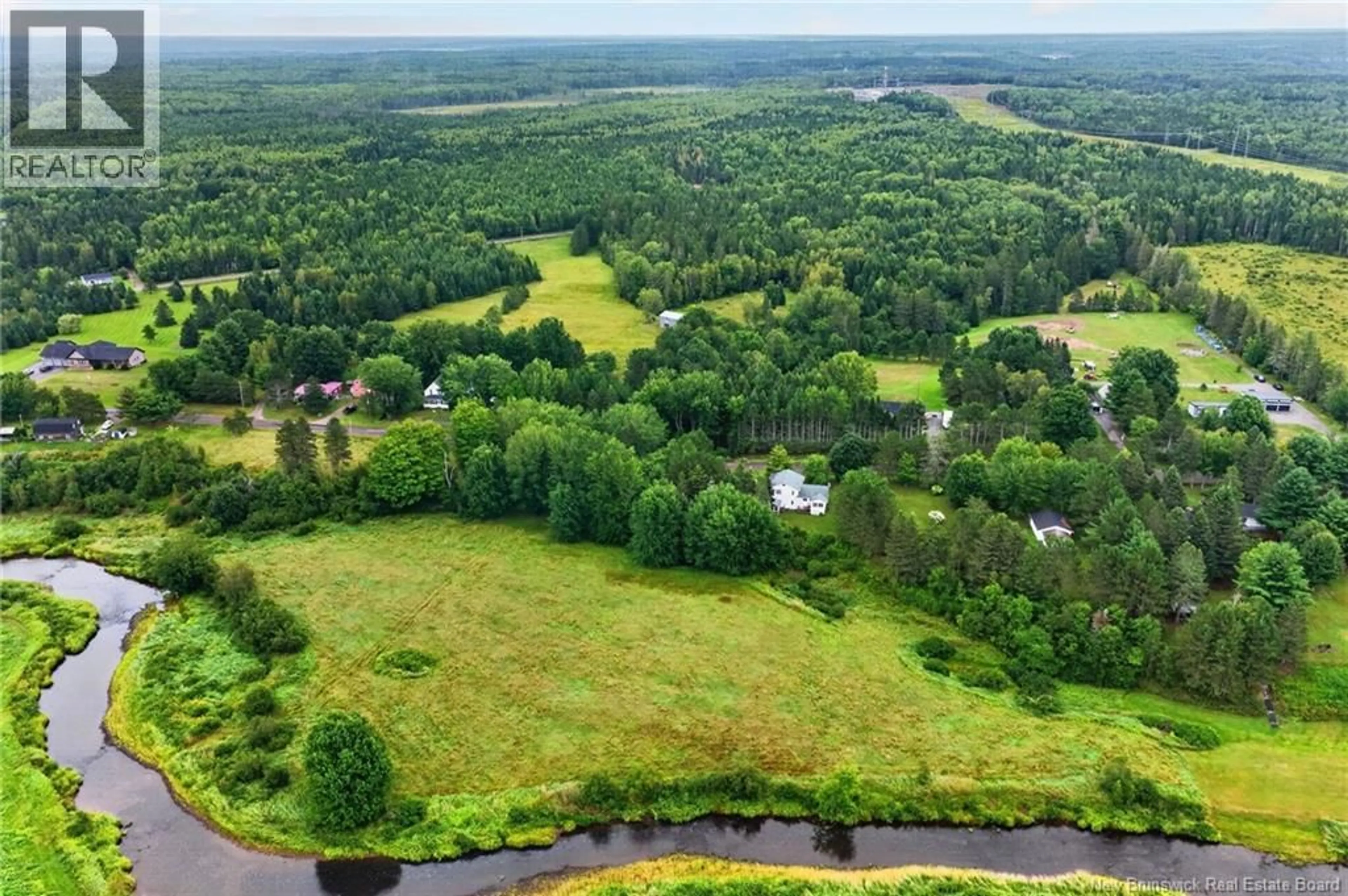 A pic from outside/outdoor area/front of a property/back of a property/a pic from drone, forest/trees view for 47 MOLLINS ROAD, Salisbury New Brunswick E4J2W8