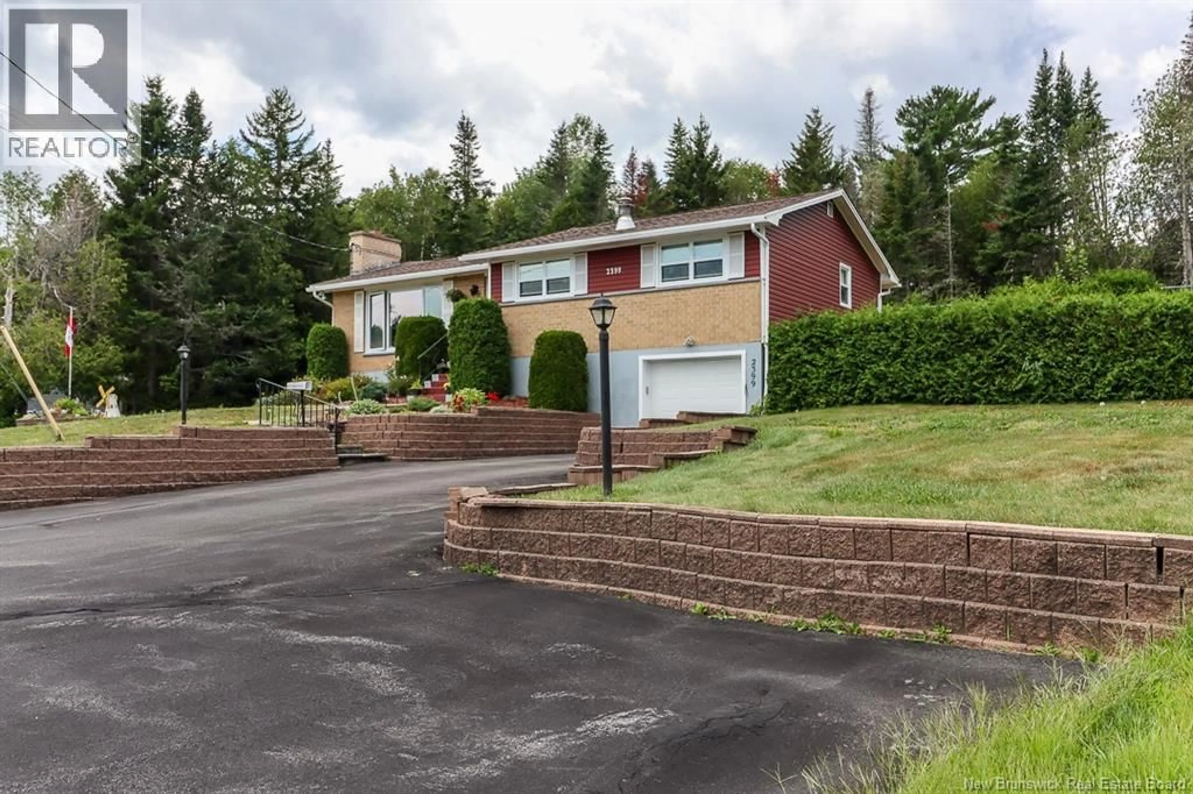 A pic from outside/outdoor area/front of a property/back of a property/a pic from drone, unknown for 2399 WESTFIELD ROAD, Saint John New Brunswick E2M6J4