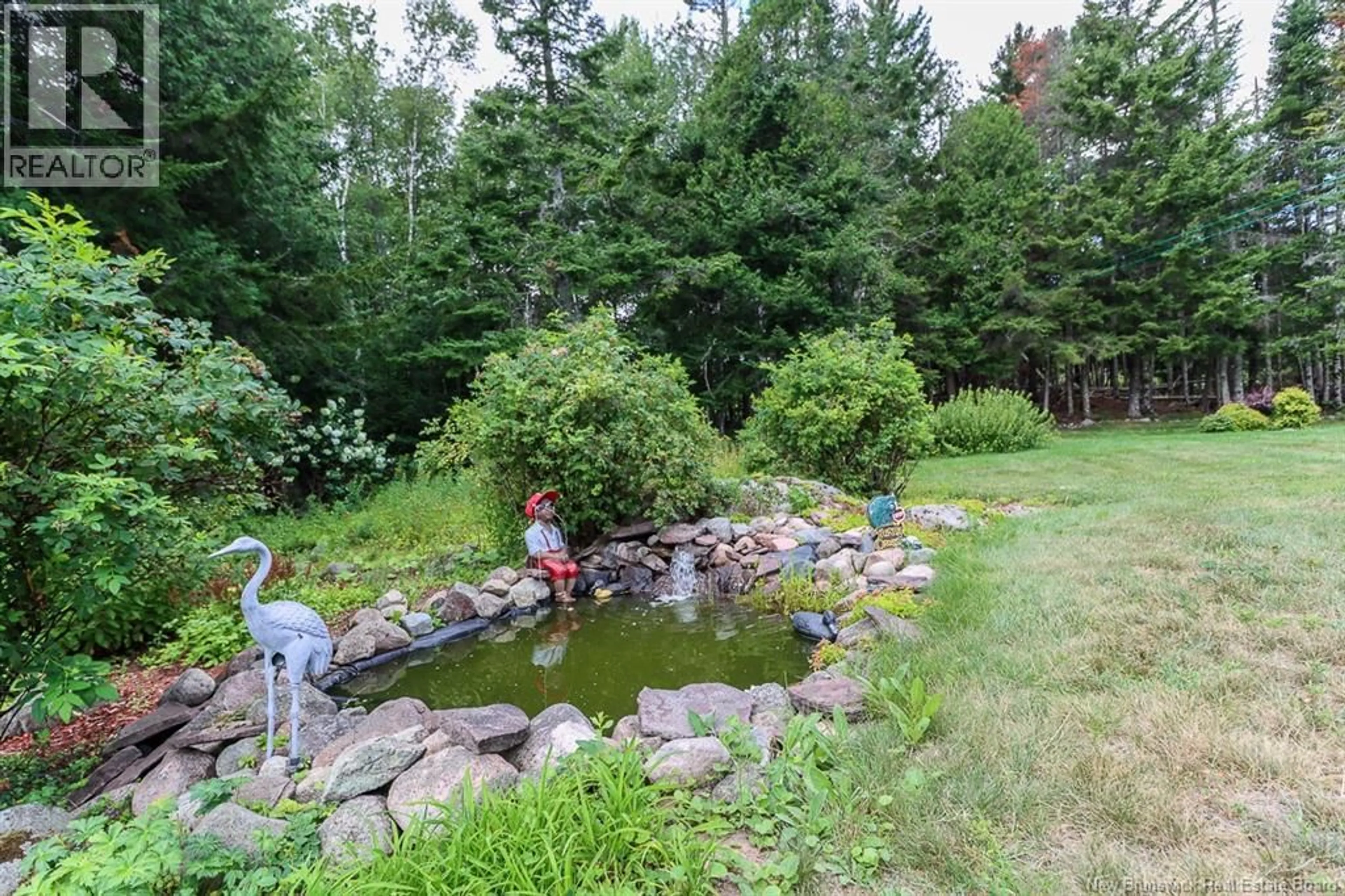 A pic from outside/outdoor area/front of a property/back of a property/a pic from drone, water/lake/river/ocean view for 2399 WESTFIELD ROAD, Saint John New Brunswick E2M6J4
