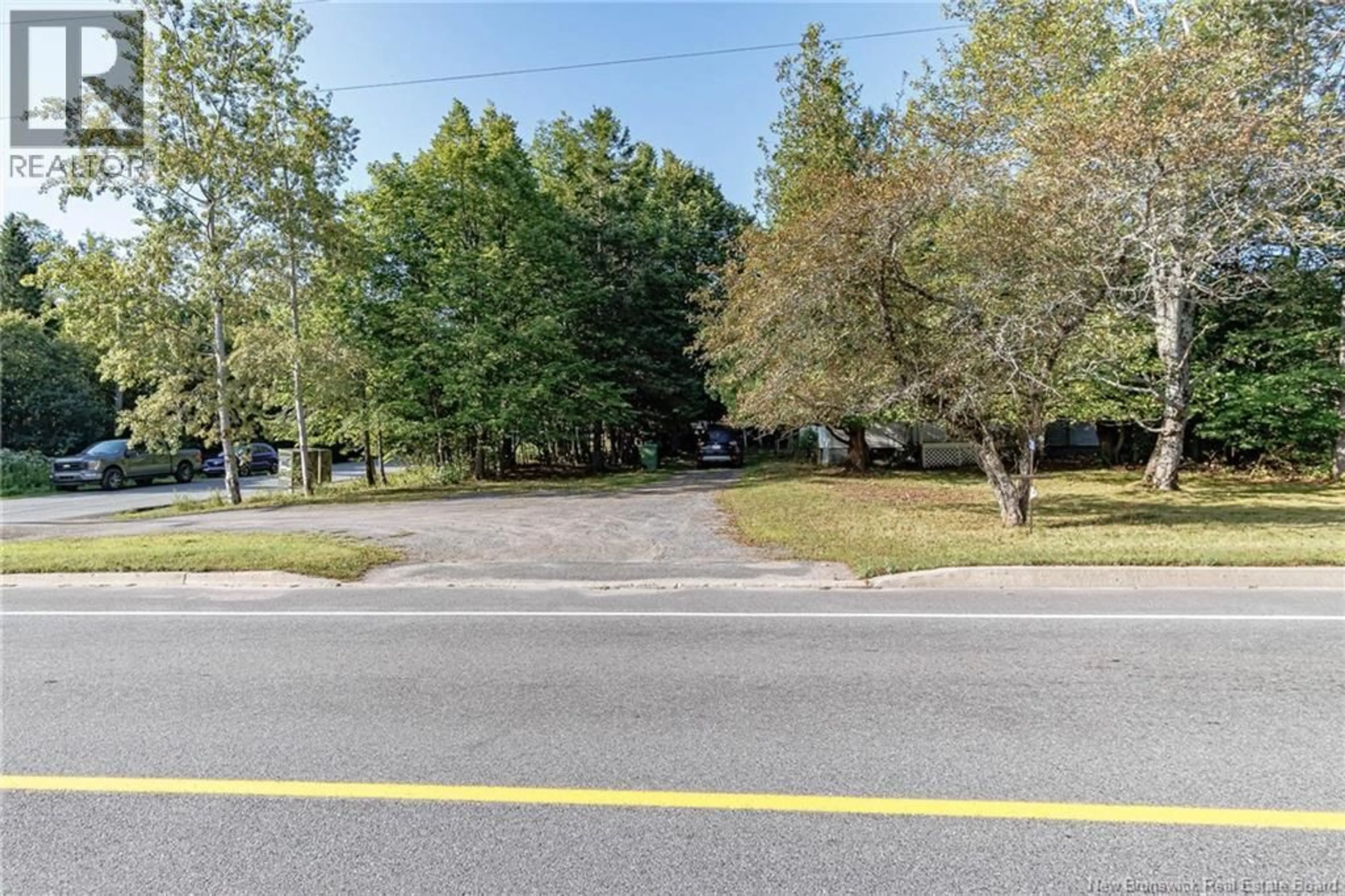 A pic from outside/outdoor area/front of a property/back of a property/a pic from drone, street for 28 MARR ROAD, Rothesay New Brunswick E2E2R5