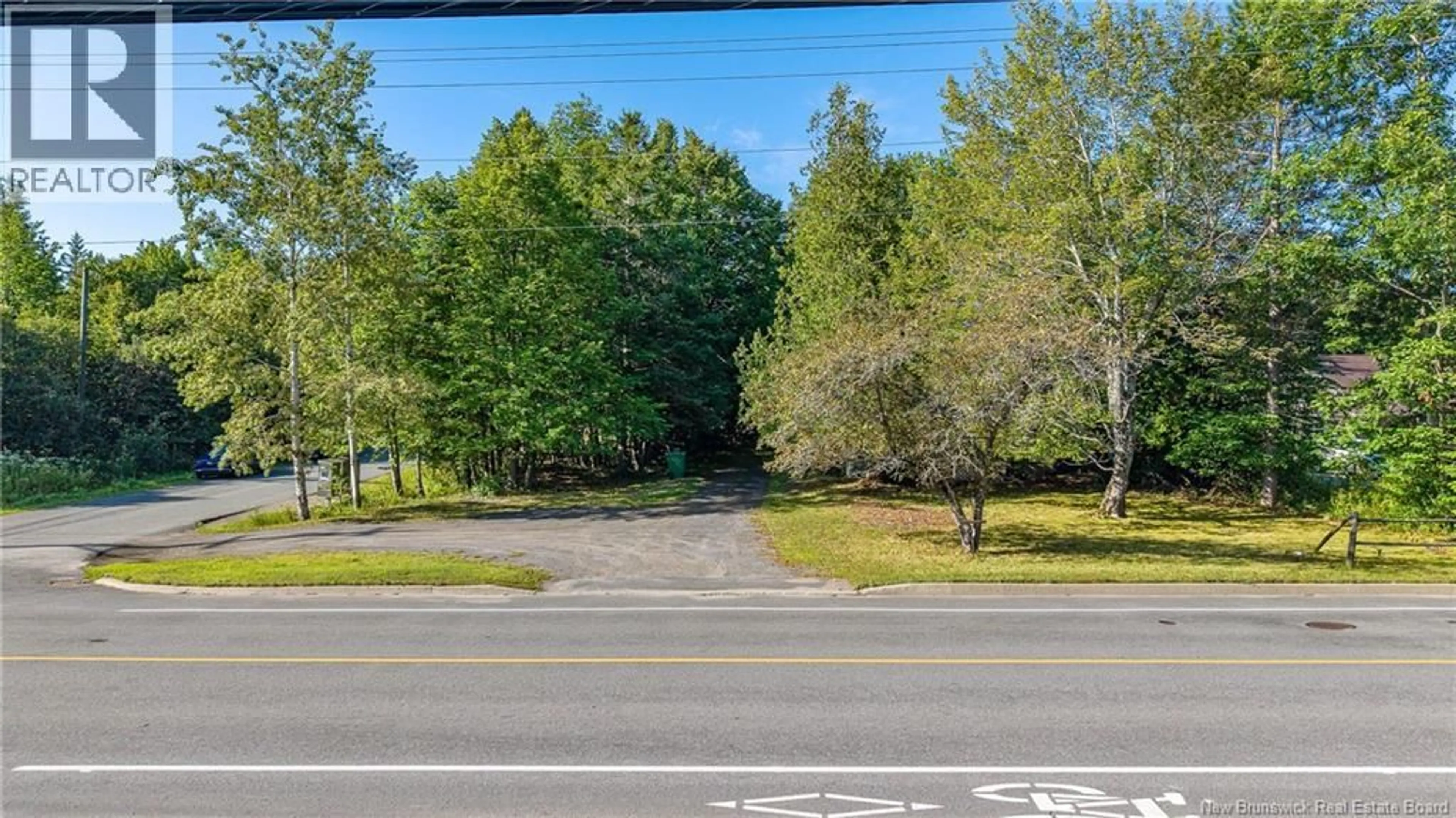 A pic from outside/outdoor area/front of a property/back of a property/a pic from drone, forest/trees view for 28 MARR ROAD, Rothesay New Brunswick E2E2R5
