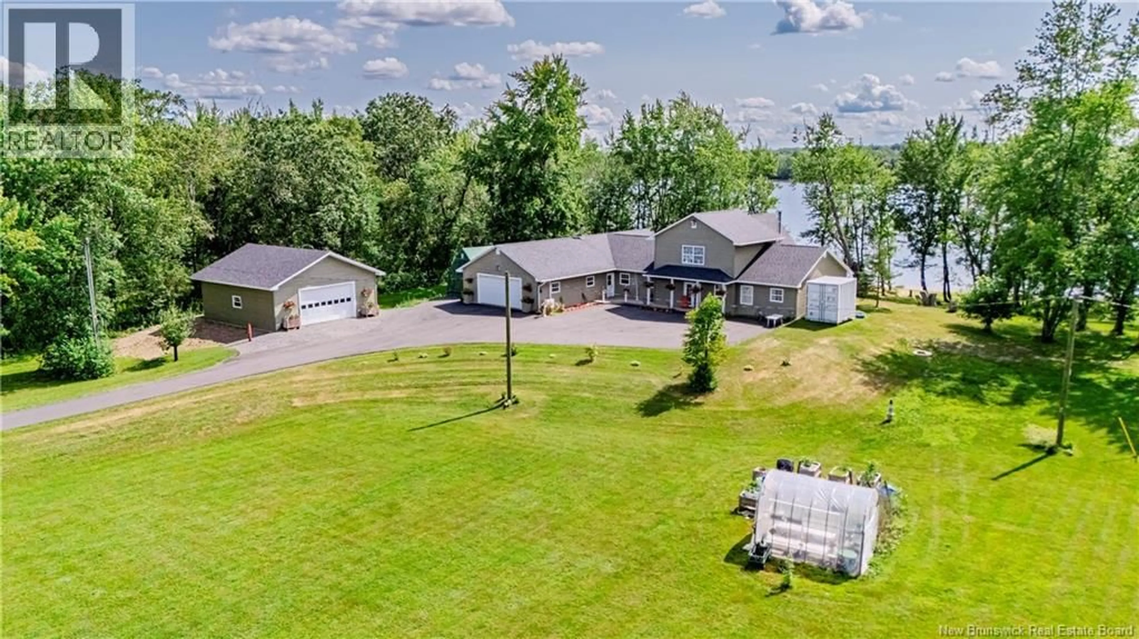 A pic from outside/outdoor area/front of a property/back of a property/a pic from drone, water/lake/river/ocean view for 380 ROUTE 105, Maugerville New Brunswick E3A8G3