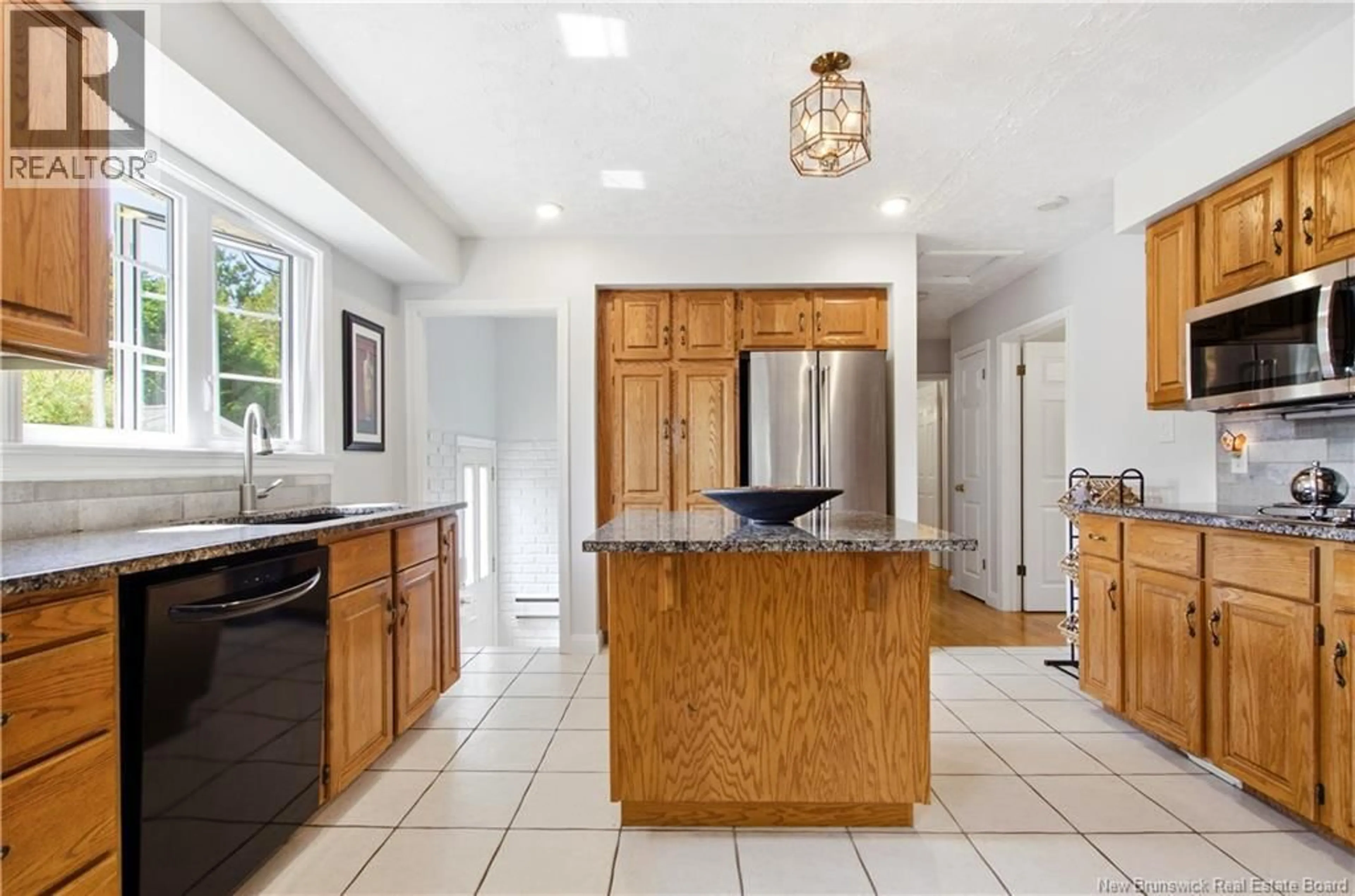 Open concept kitchen, ceramic/tile floor for 105 LEGION DRIVE, Fredericton New Brunswick E3A2K9