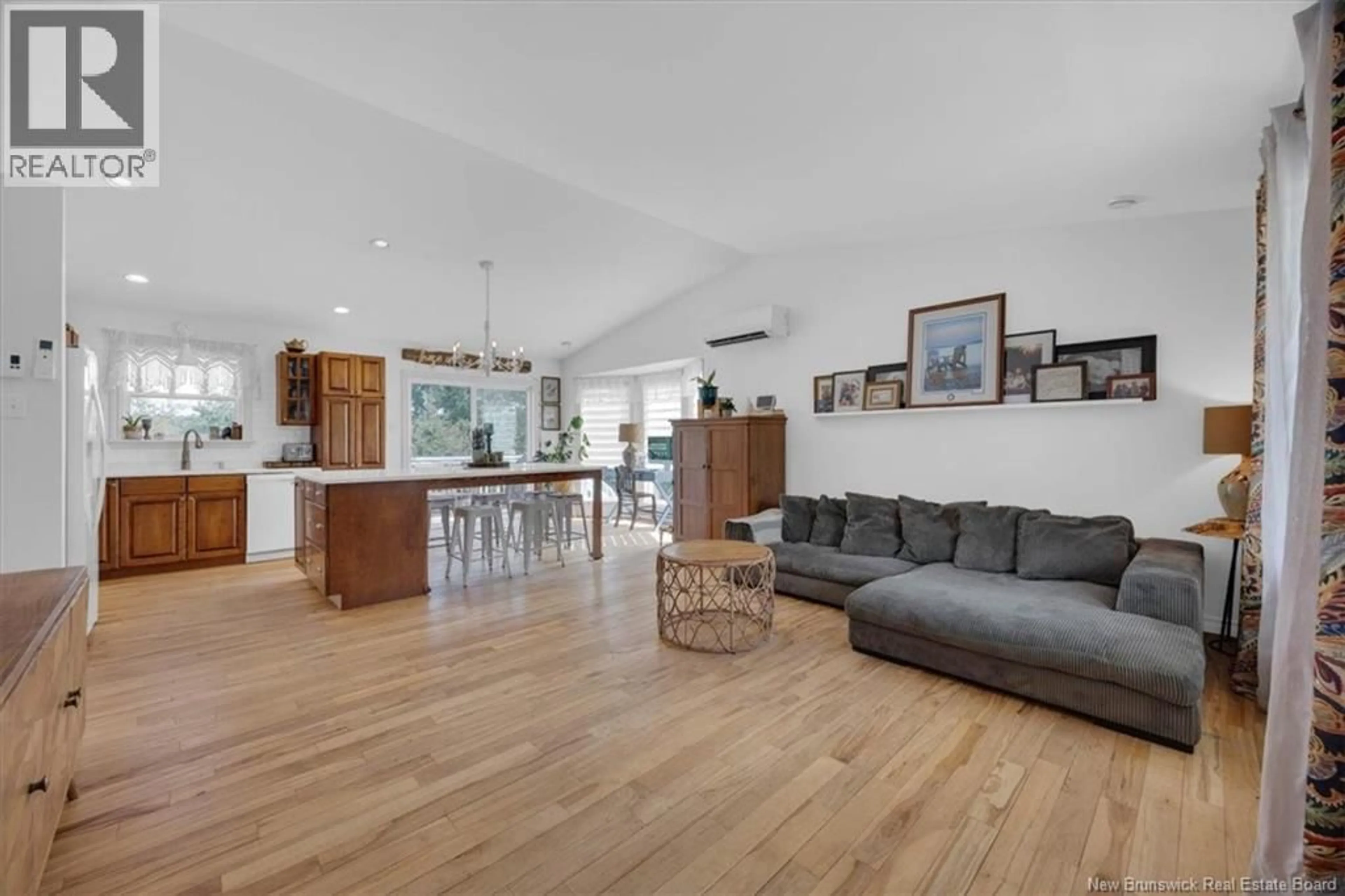 Open concept kitchen, wood/laminate floor for 148 GONDOLA BLVD, Quispamsis New Brunswick E2E1J3
