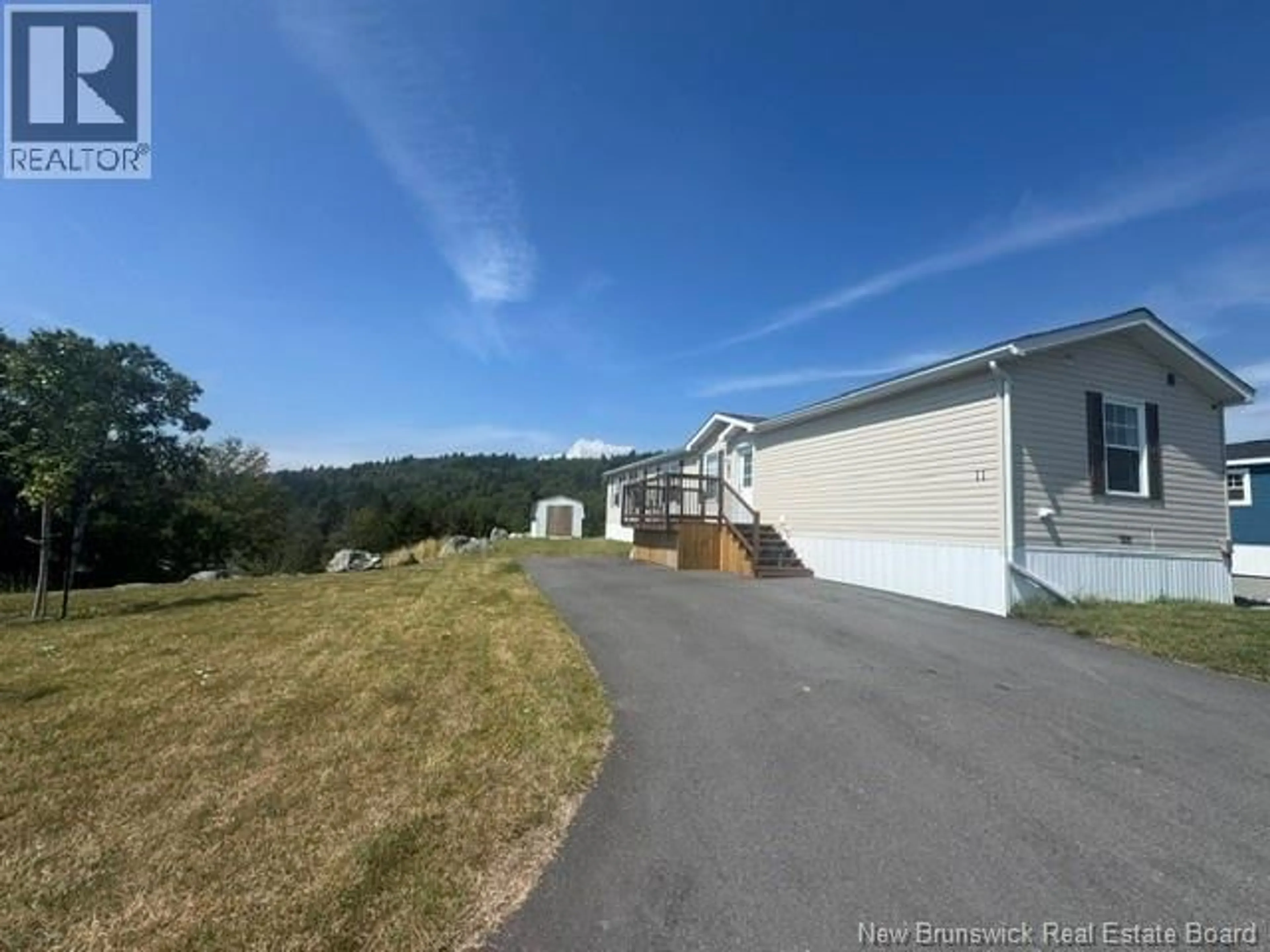 A pic from outside/outdoor area/front of a property/back of a property/a pic from drone, mountain view for 11 REX HURLEY, Saint John New Brunswick E2H0B6