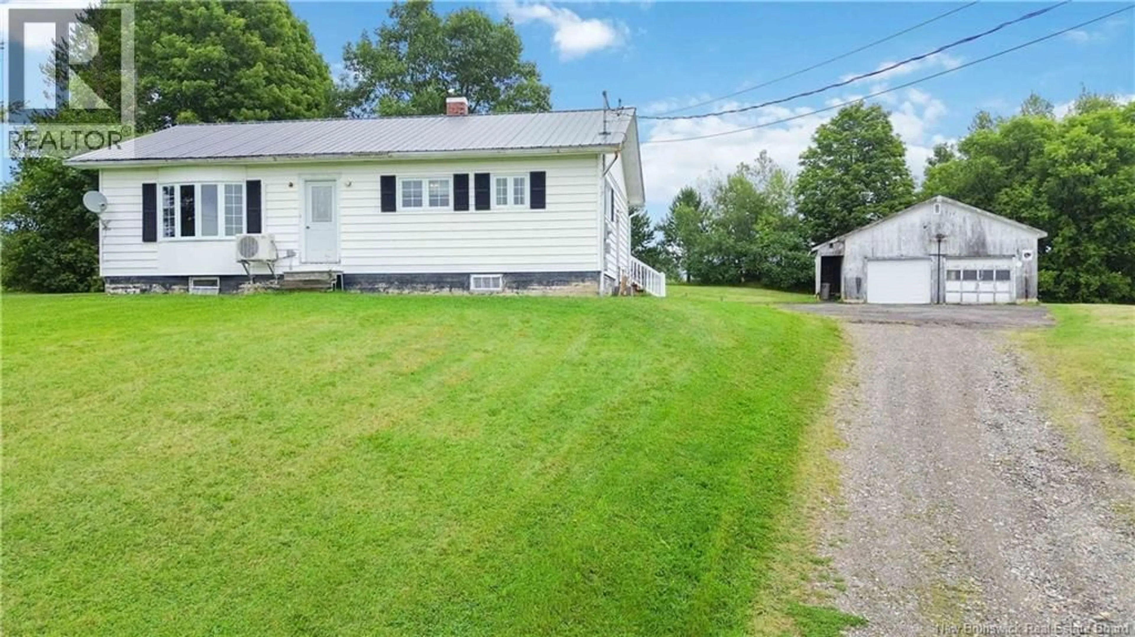 A pic from outside/outdoor area/front of a property/back of a property/a pic from drone, street for 3164 MAIN STREET, Centreville New Brunswick E7K3A3