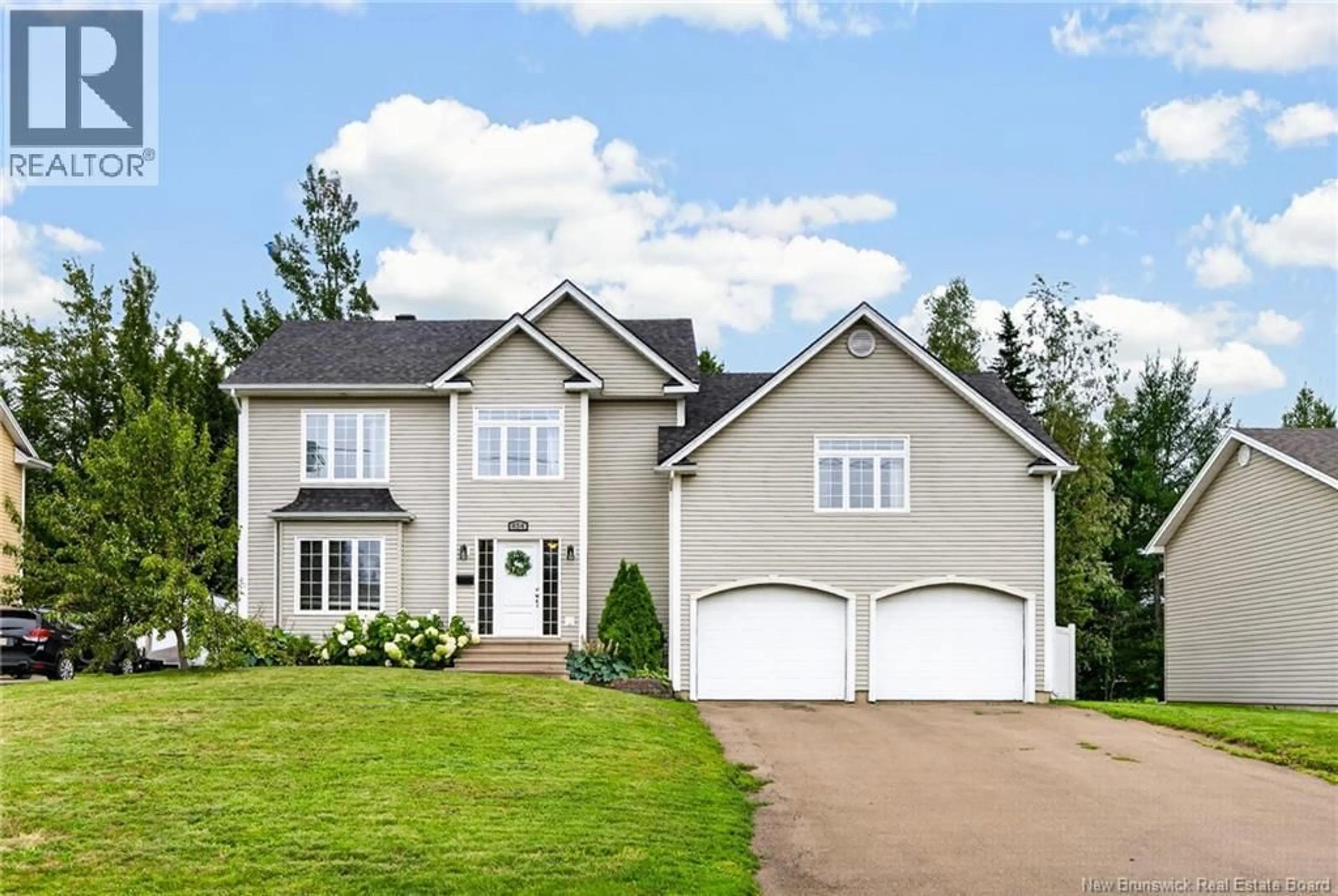 Home with vinyl exterior material, street for 454 ALFRED LEGER, Dieppe New Brunswick E1A0B2