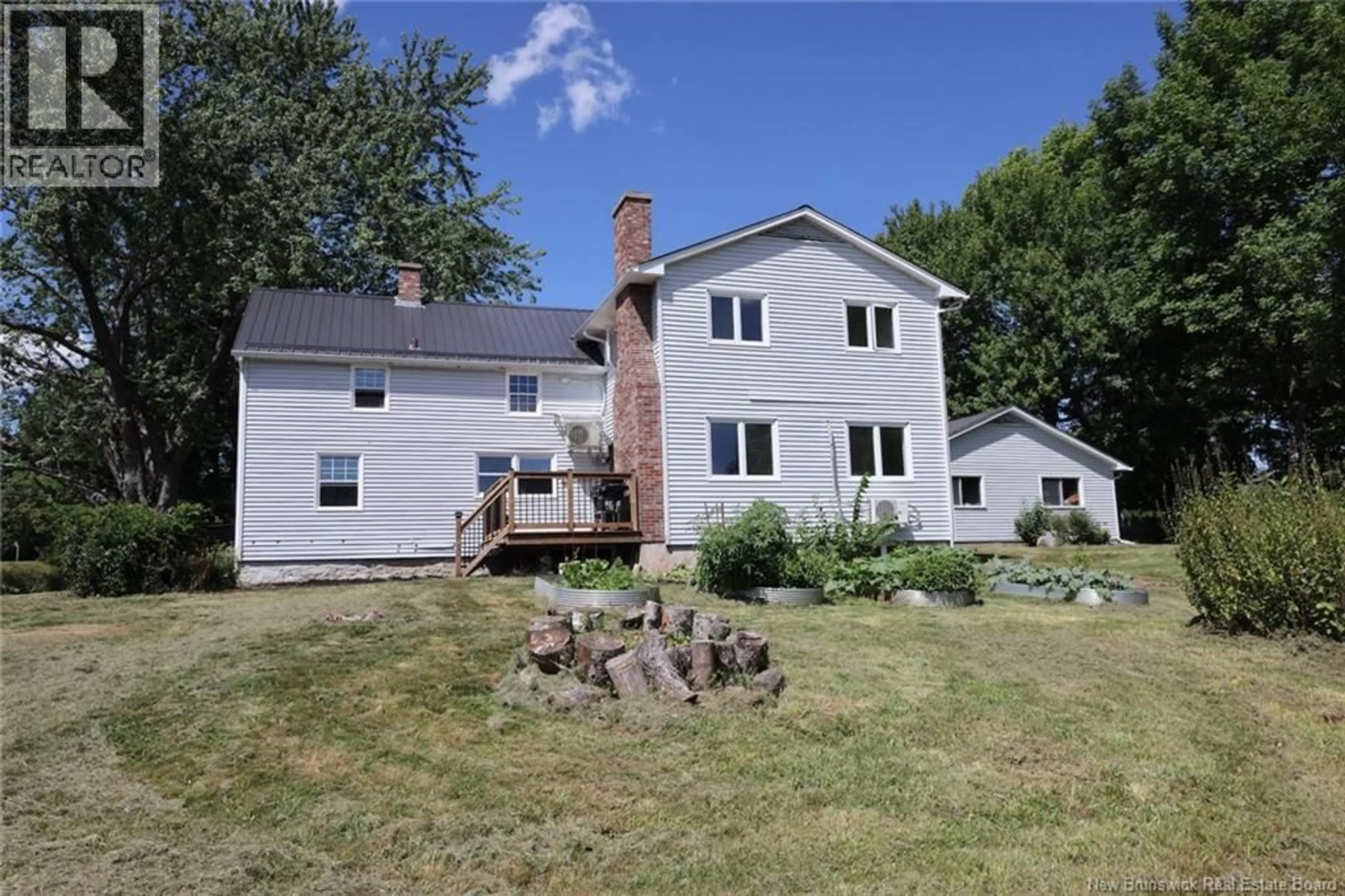 A pic from outside/outdoor area/front of a property/back of a property/a pic from drone, unknown for 383 NEW MARYLAND HWY, New Maryland New Brunswick E3C2H5
