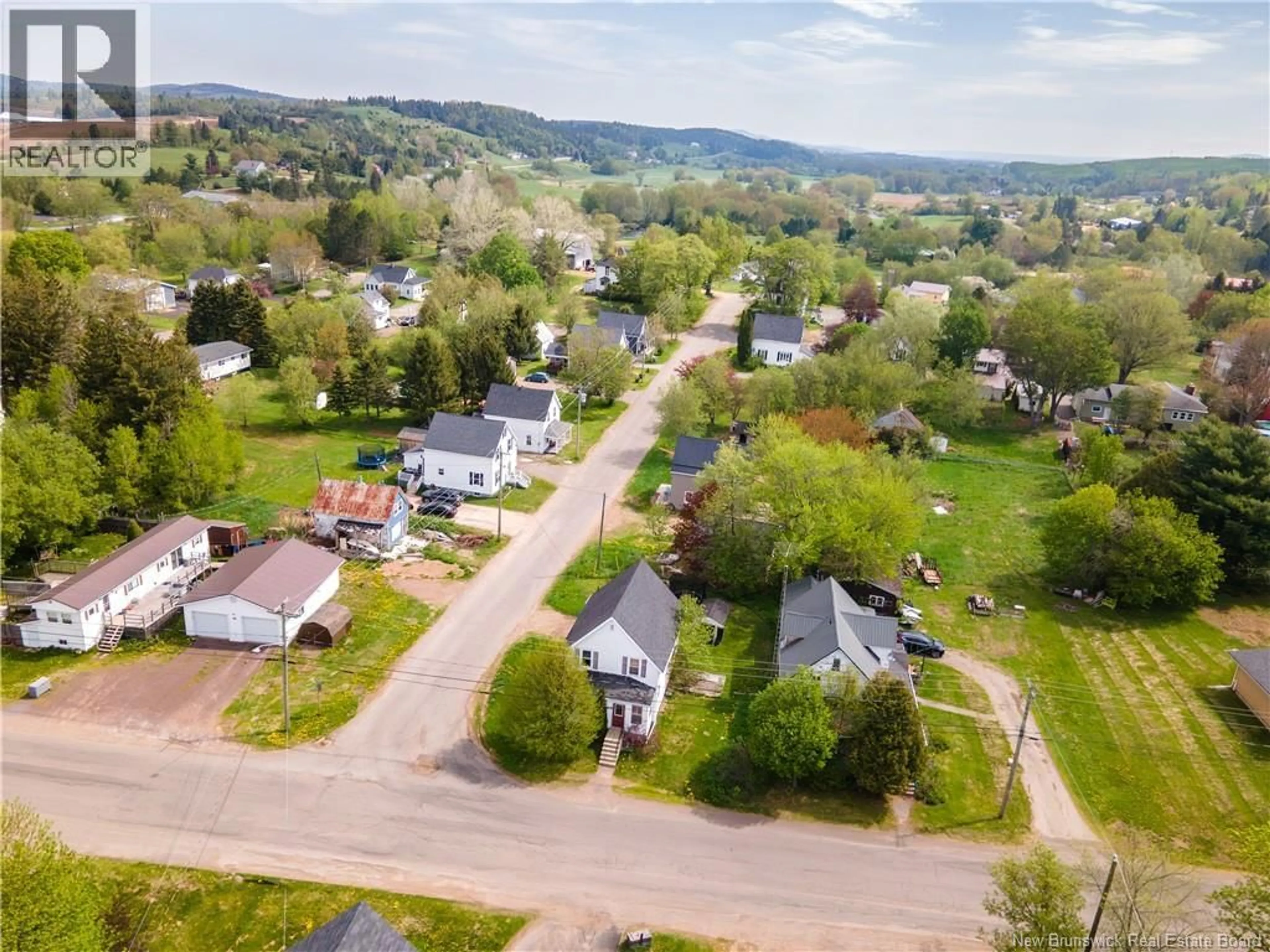 A pic from outside/outdoor area/front of a property/back of a property/a pic from drone, street for 22 BRIDGE STREET, Apohaqui New Brunswick E5P3M6