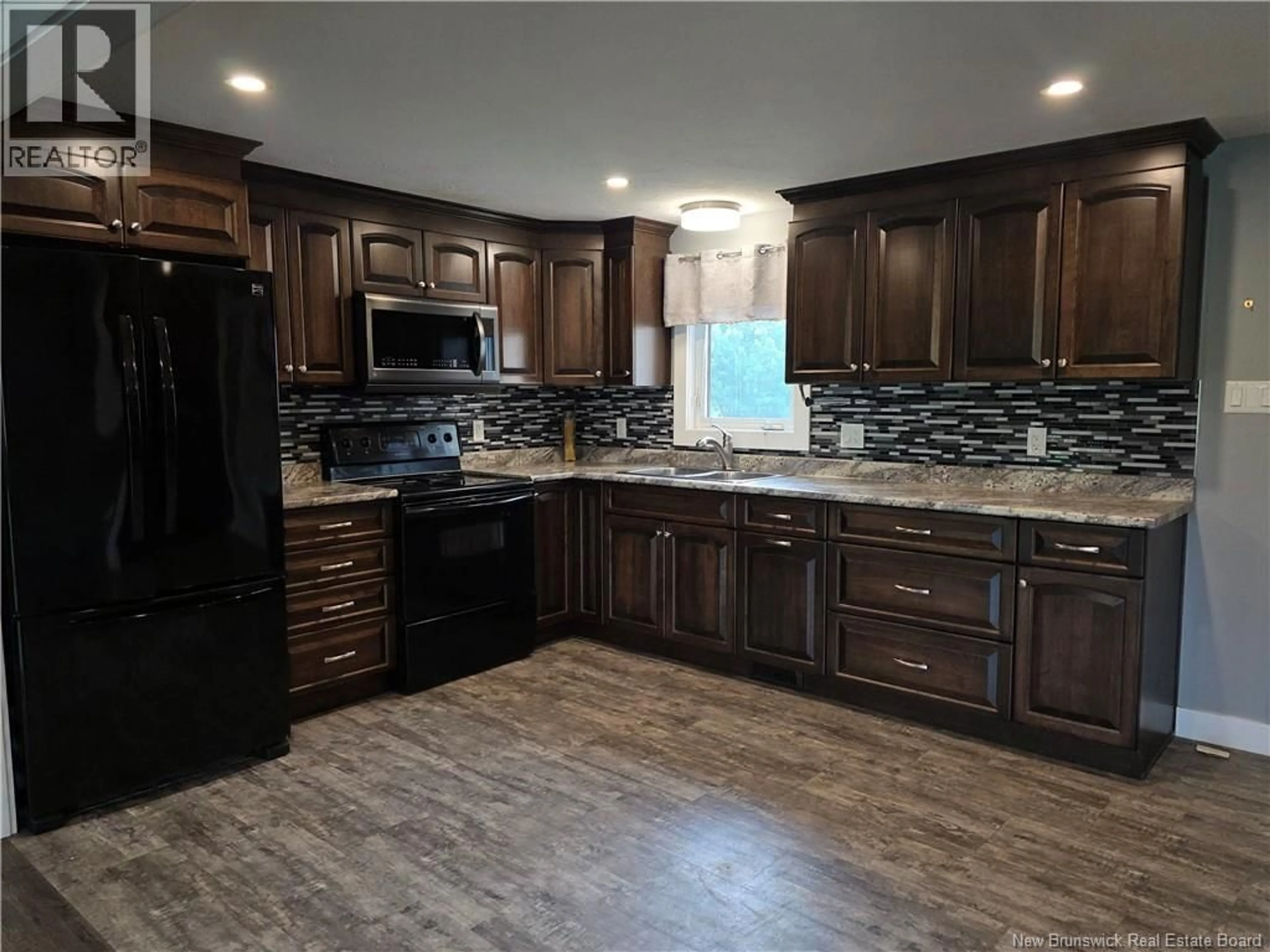 Open concept kitchen, ceramic/tile floor for 6169 ROUTE 515, Saint-Paul New Brunswick E4T3W4