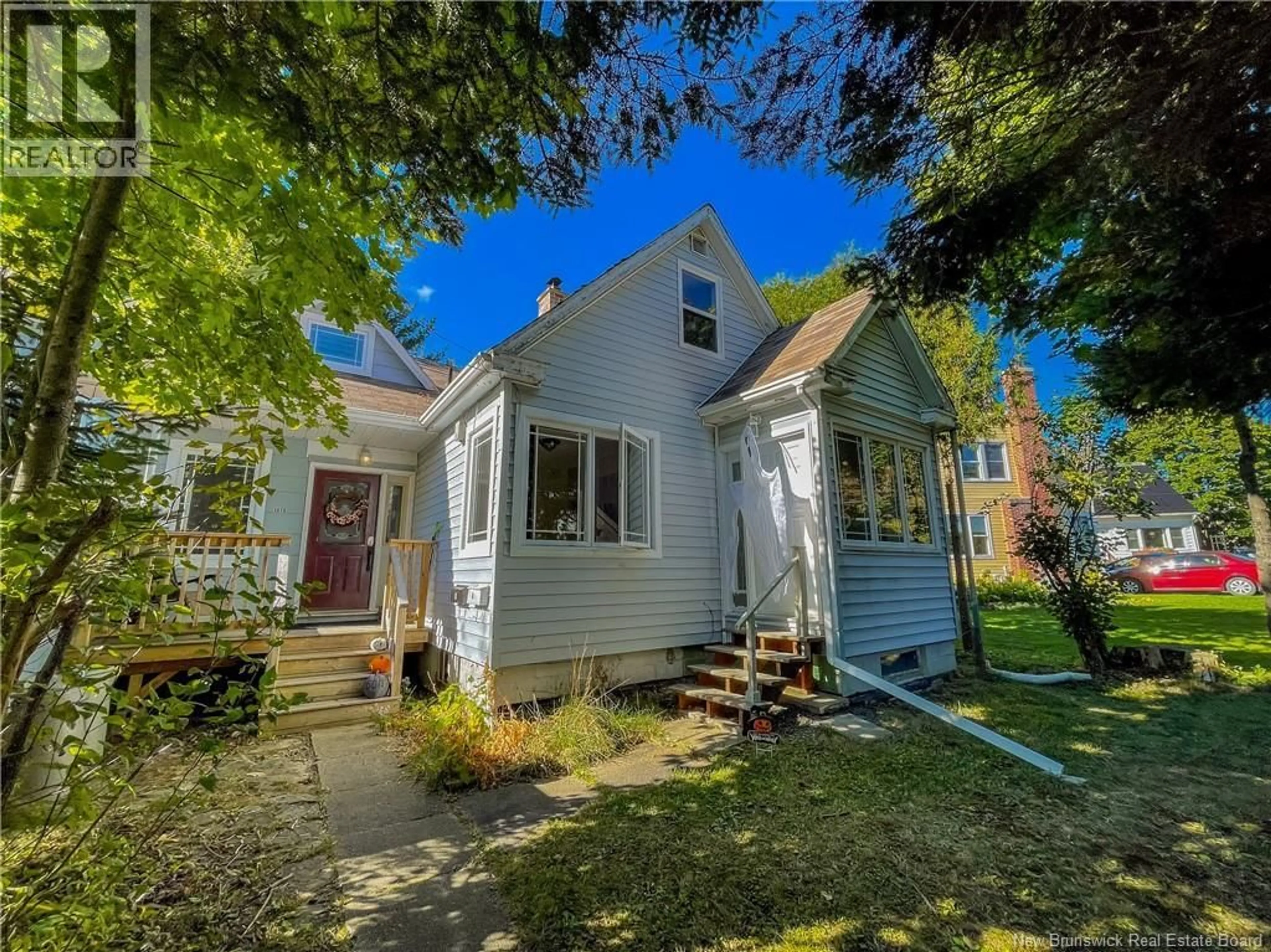 A pic from outside/outdoor area/front of a property/back of a property/a pic from drone, street for Units A+B - 107 FULTON AVENUE AVENUE, Fredericton New Brunswick E3A2B5