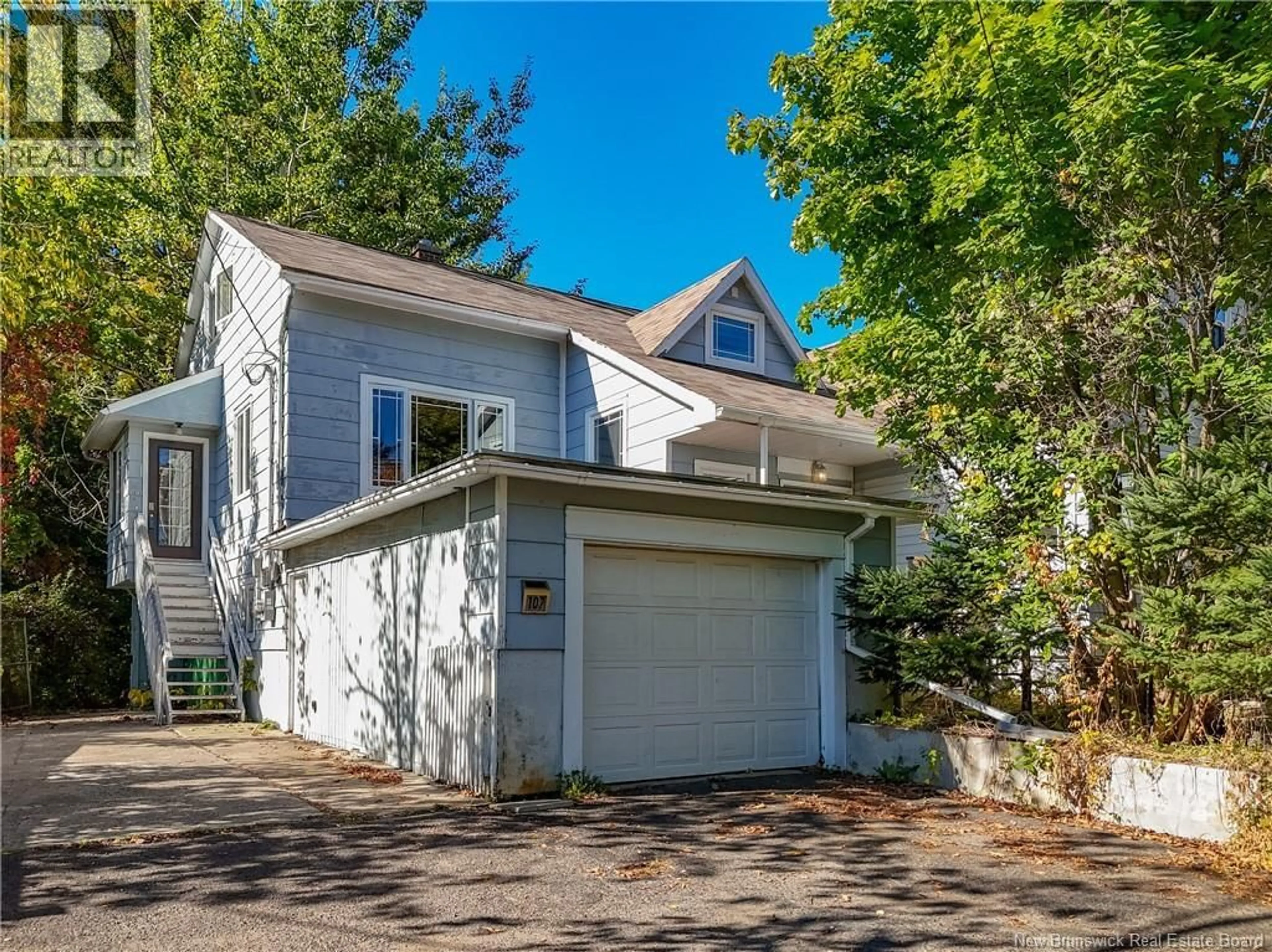 Home with vinyl exterior material, street for Units A+B - 107 FULTON AVENUE AVENUE, Fredericton New Brunswick E3A2B5