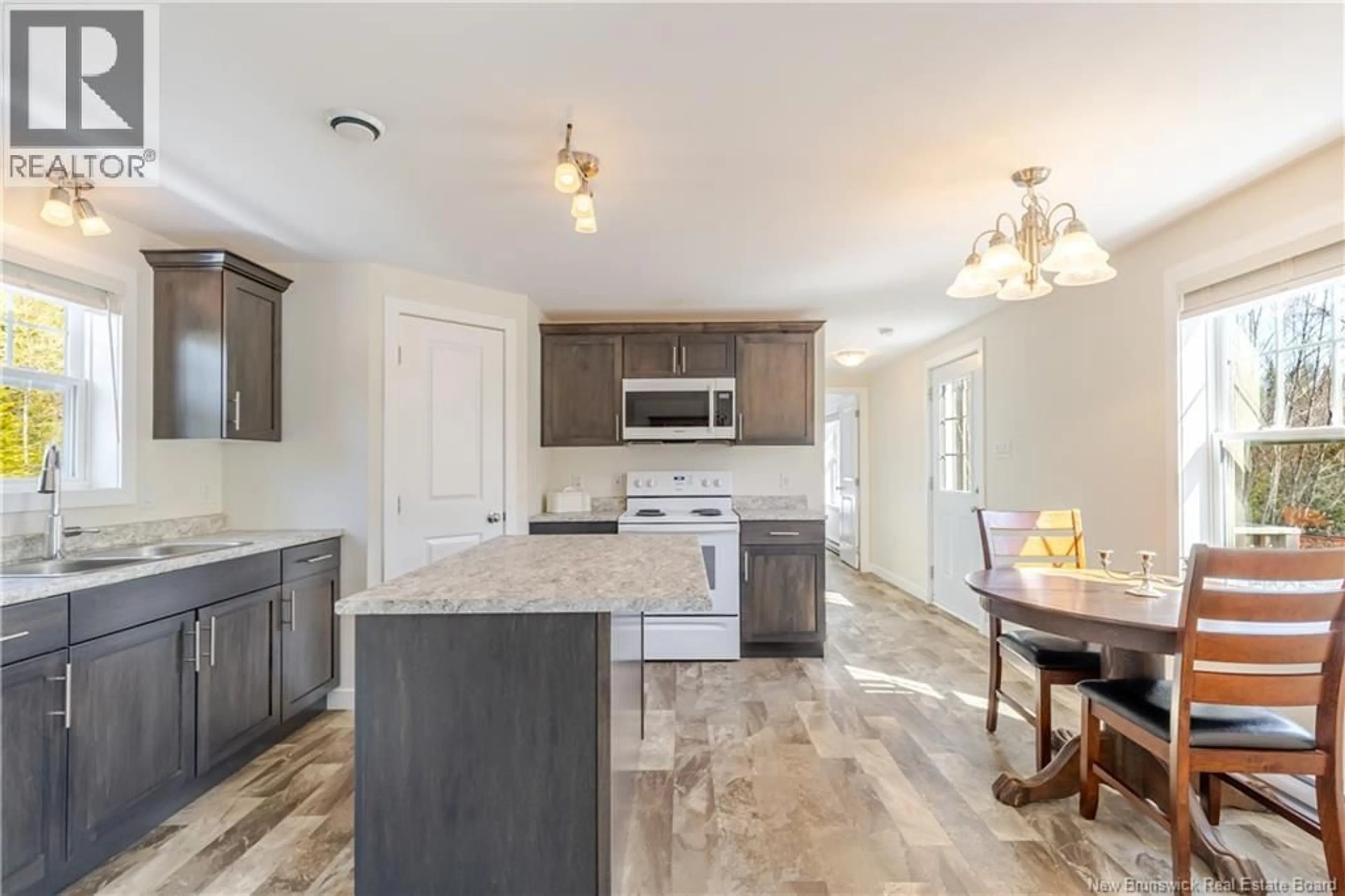 Open concept kitchen, ceramic/tile floor for 247 POST ROAD, Minto New Brunswick E4B3A2