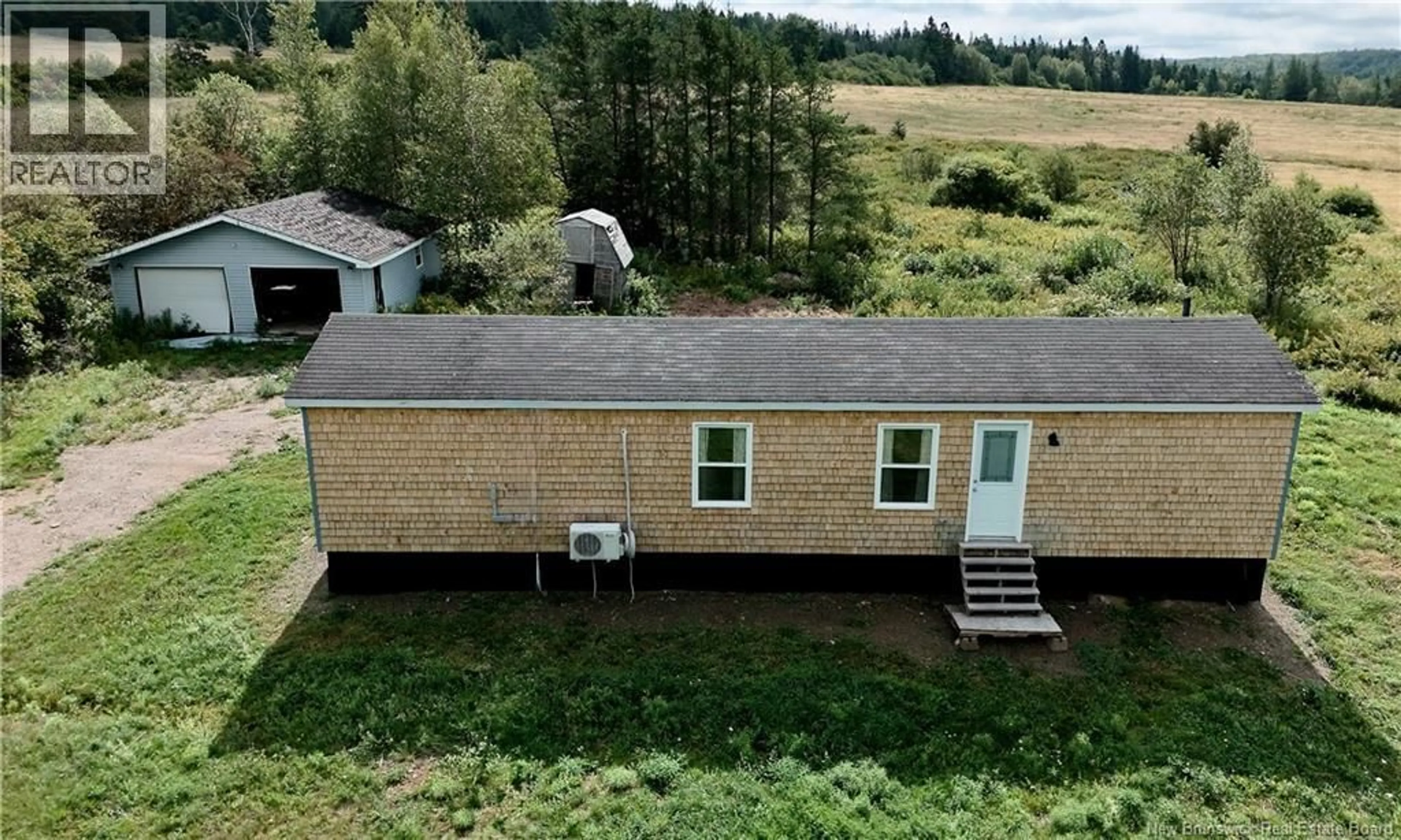 A pic from outside/outdoor area/front of a property/back of a property/a pic from drone, building for 466 POODIAC ROAD, Poodiac New Brunswick E4E3X1