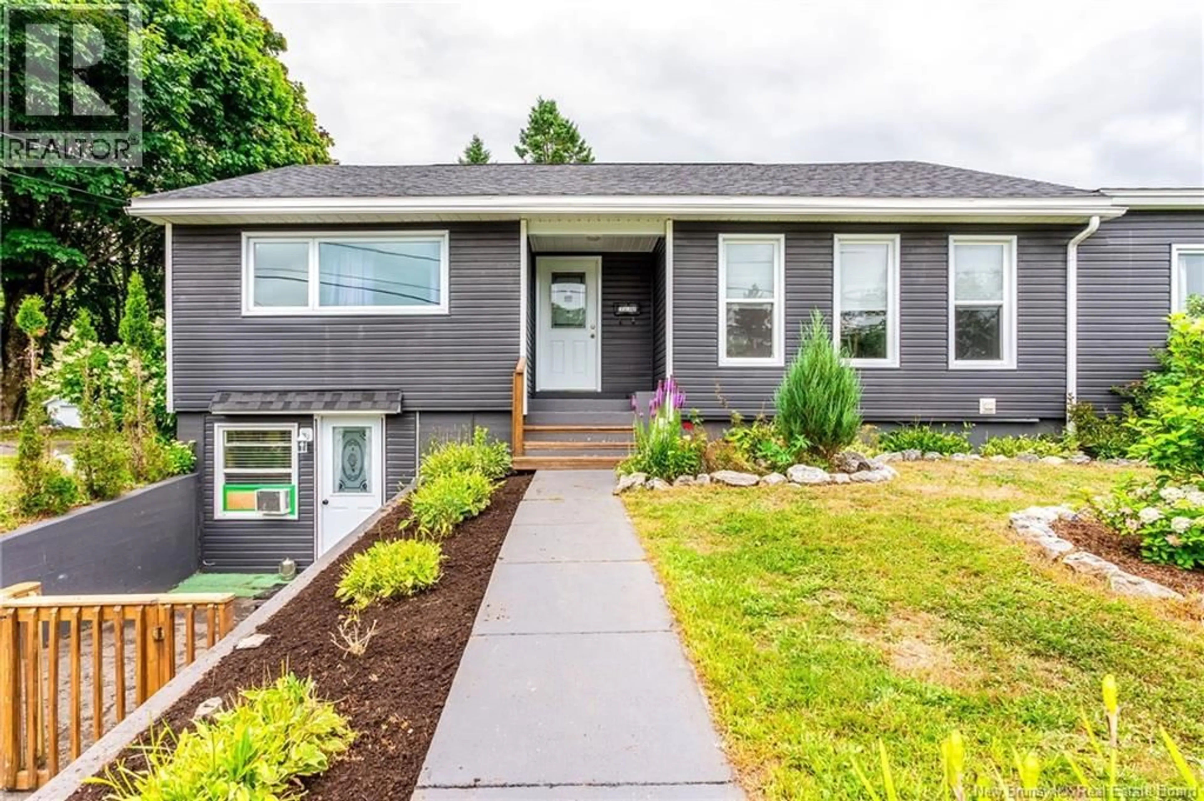 Home with vinyl exterior material, street for 40 CHARLES STREET, Saint John New Brunswick E2J3P7