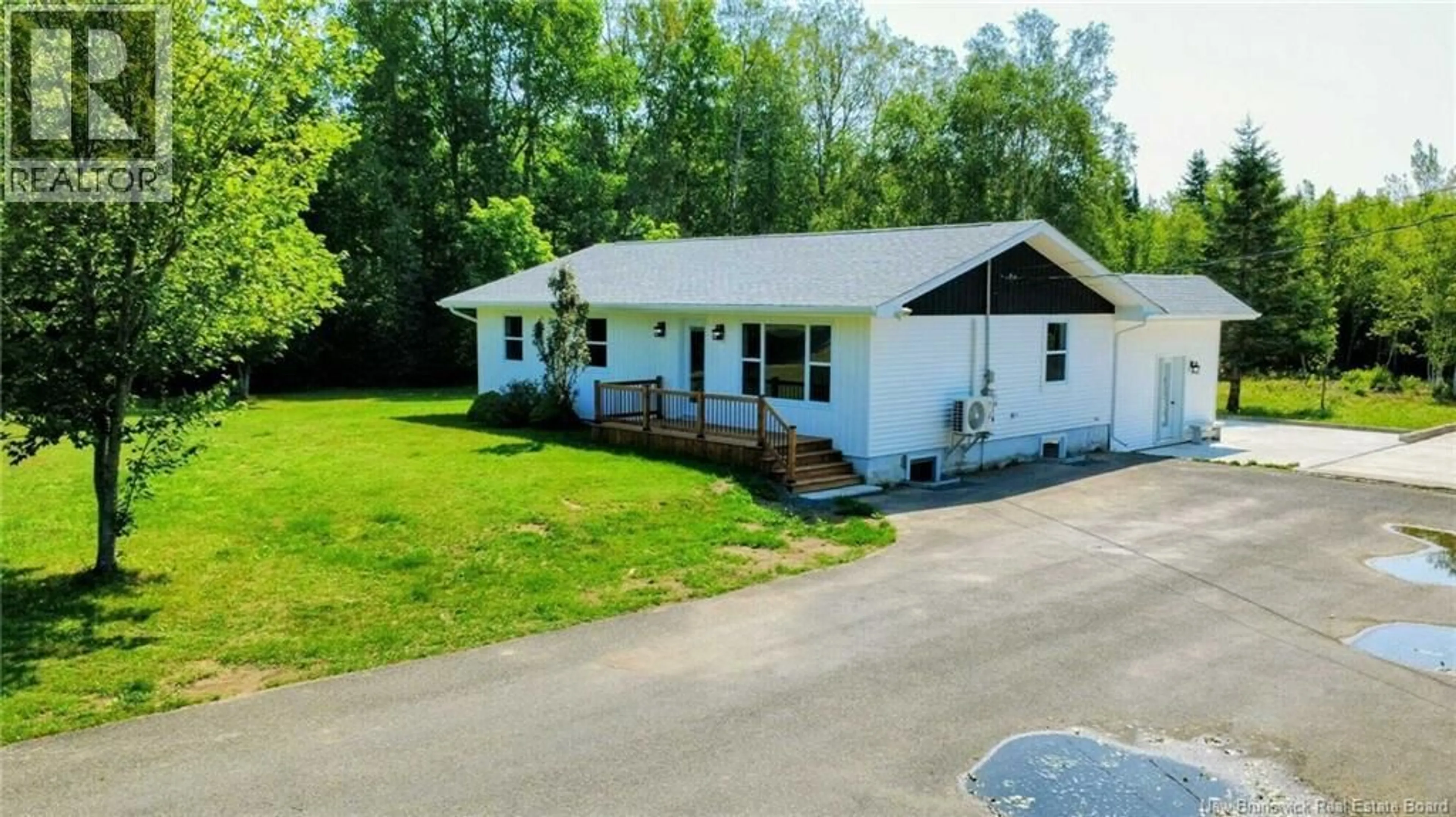 A pic from outside/outdoor area/front of a property/back of a property/a pic from drone, unknown for 1318 CHEM. SAULNIER O, Saumarez New Brunswick E1X2J5