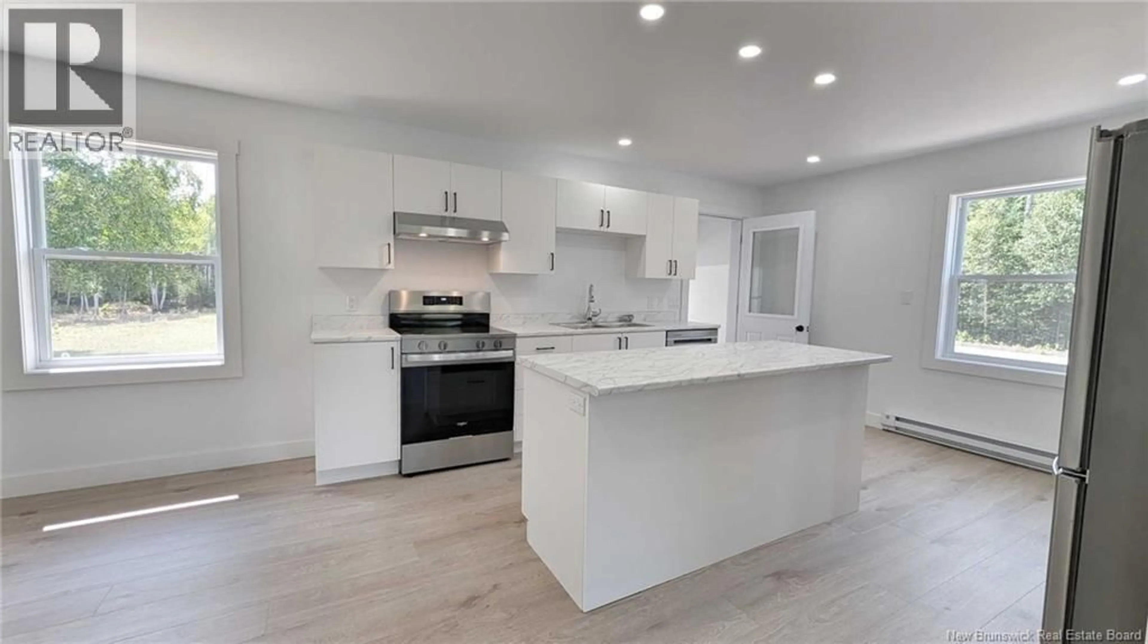 Open concept kitchen, ceramic/tile floor for 1318 CHEM. SAULNIER O, Saumarez New Brunswick E1X2J5