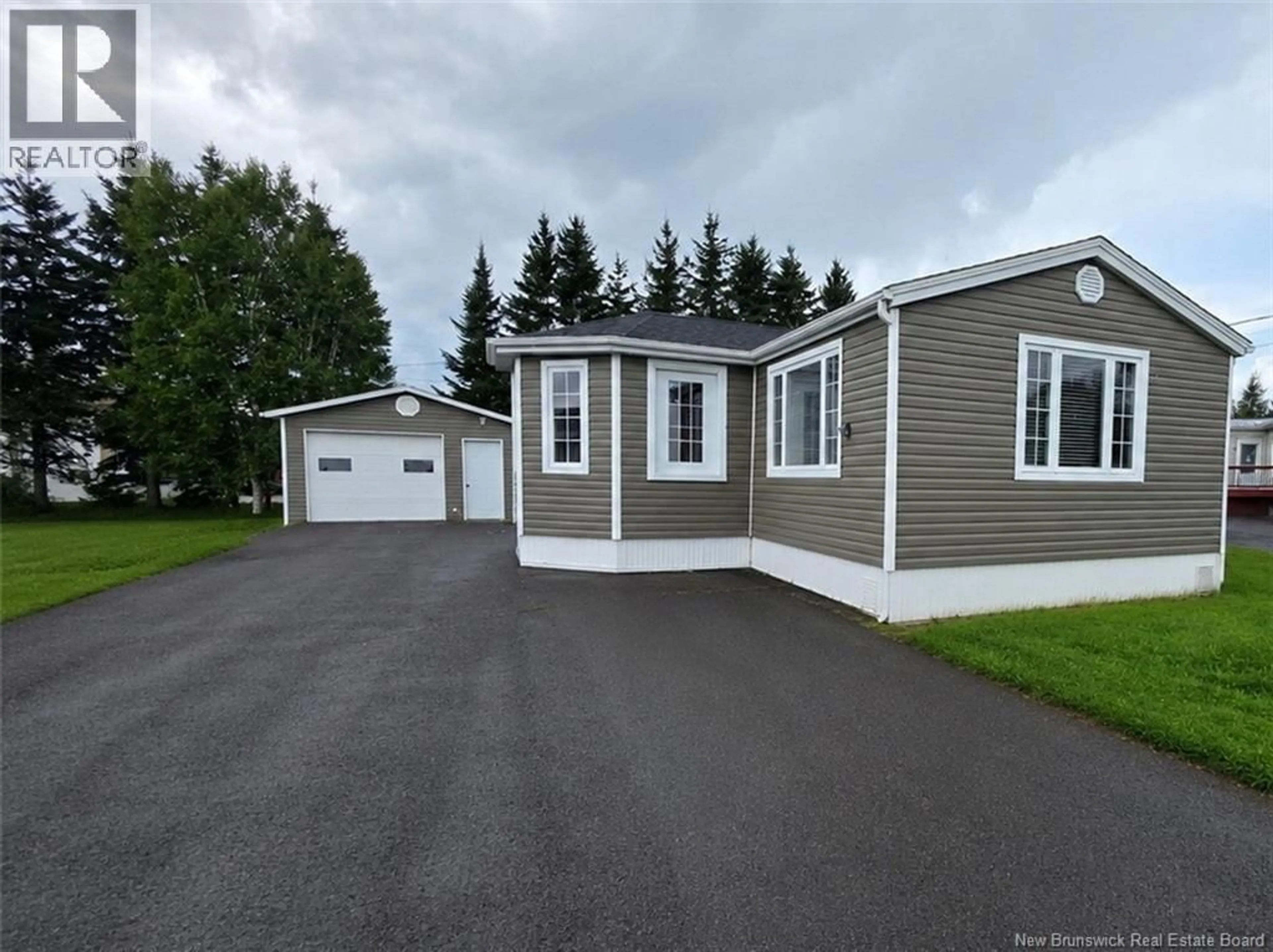 Home with vinyl exterior material, street for 40 LAVALLEE STREET, Saint-Jacques New Brunswick E7B1T3