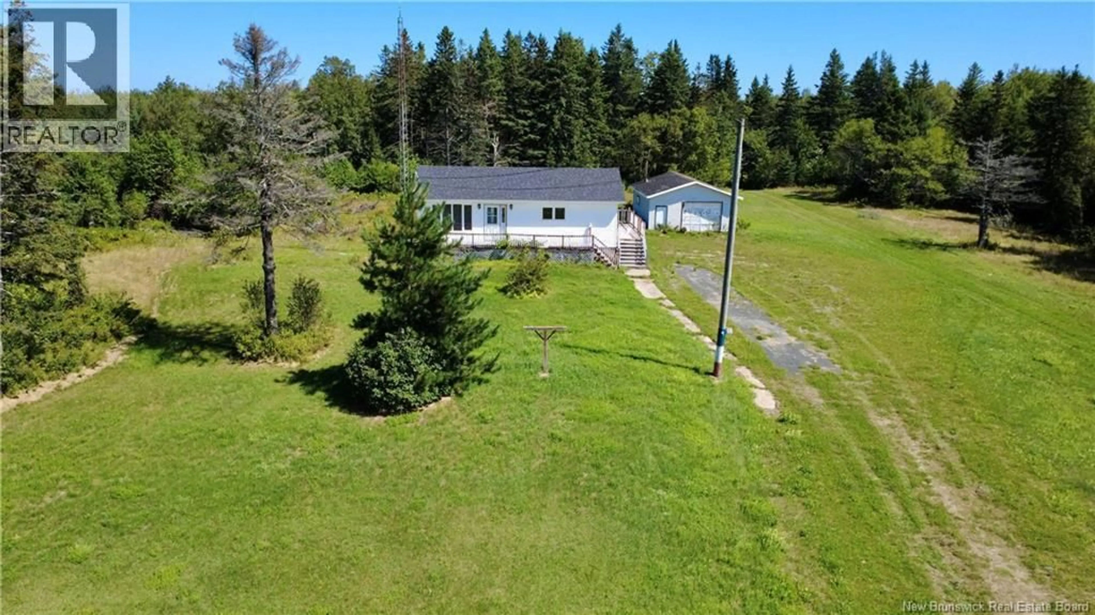 A pic from outside/outdoor area/front of a property/back of a property/a pic from drone, unknown for 3109 RUE MORAIS, Bas-Caraquet New Brunswick E1W6A5