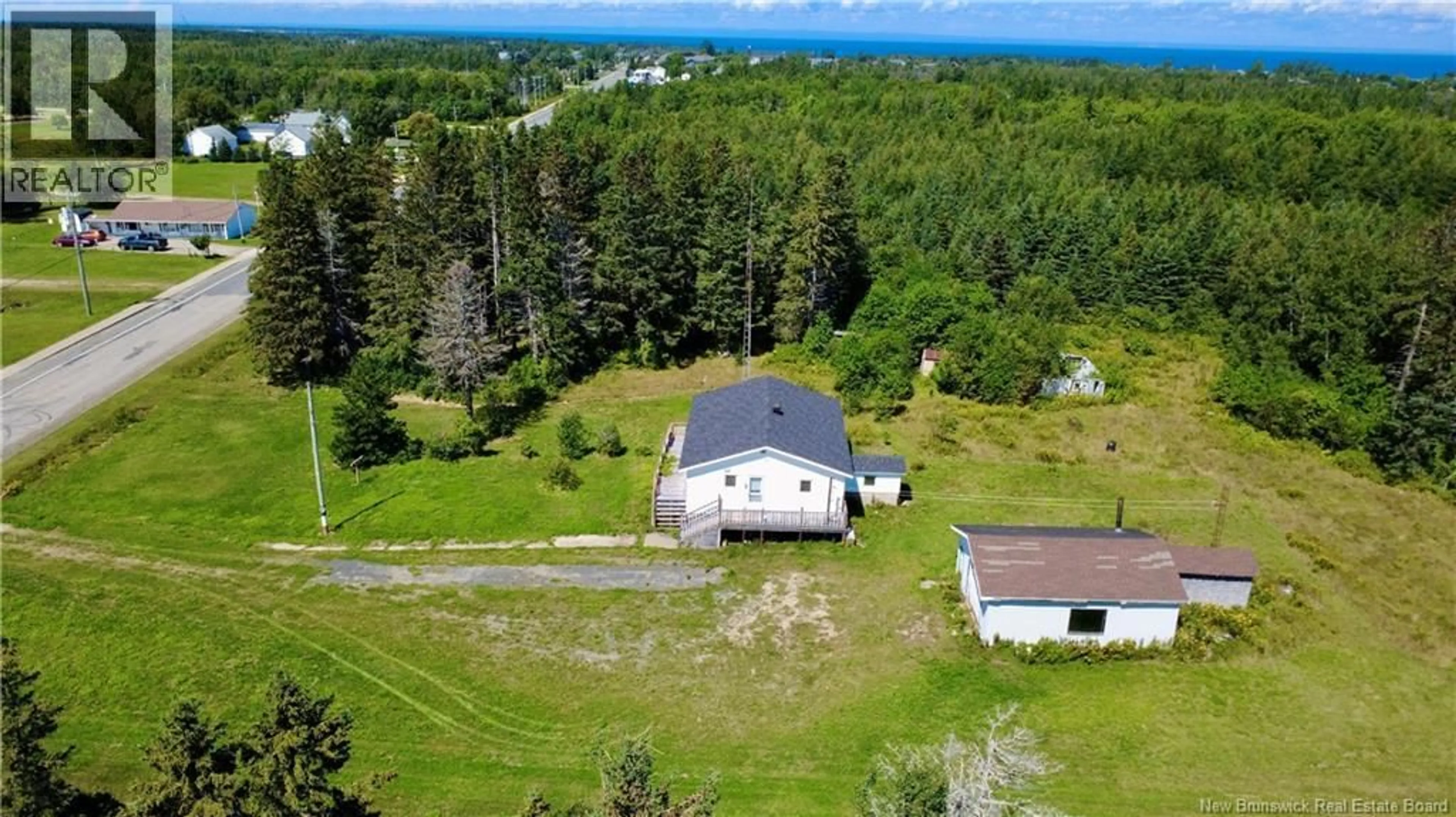 A pic from outside/outdoor area/front of a property/back of a property/a pic from drone, unknown for 3109 RUE MORAIS, Bas-Caraquet New Brunswick E1W6A5