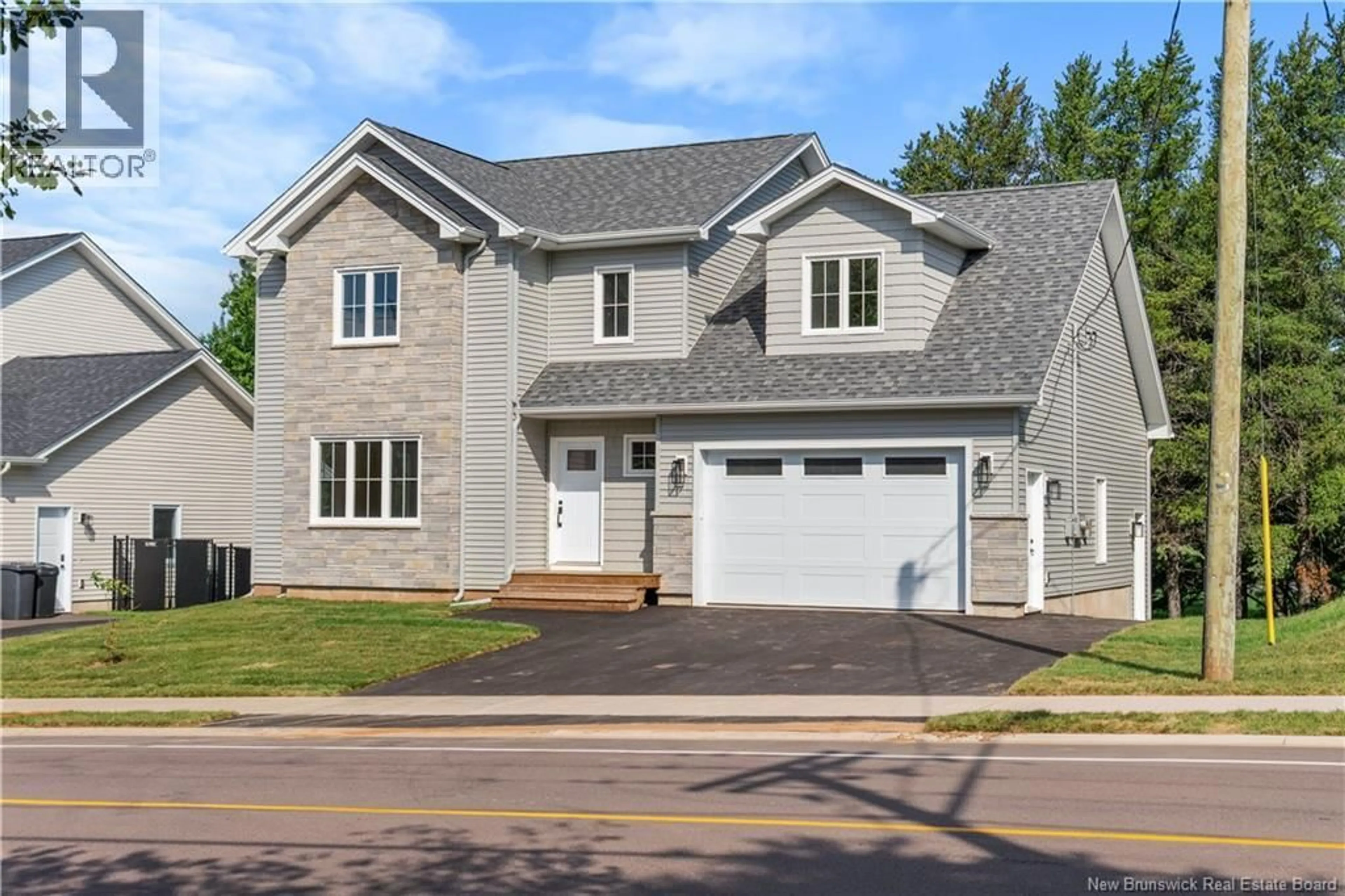 Home with brick exterior material, street for 210 BREAUX BRIDGE, Shediac New Brunswick E4P0Y3