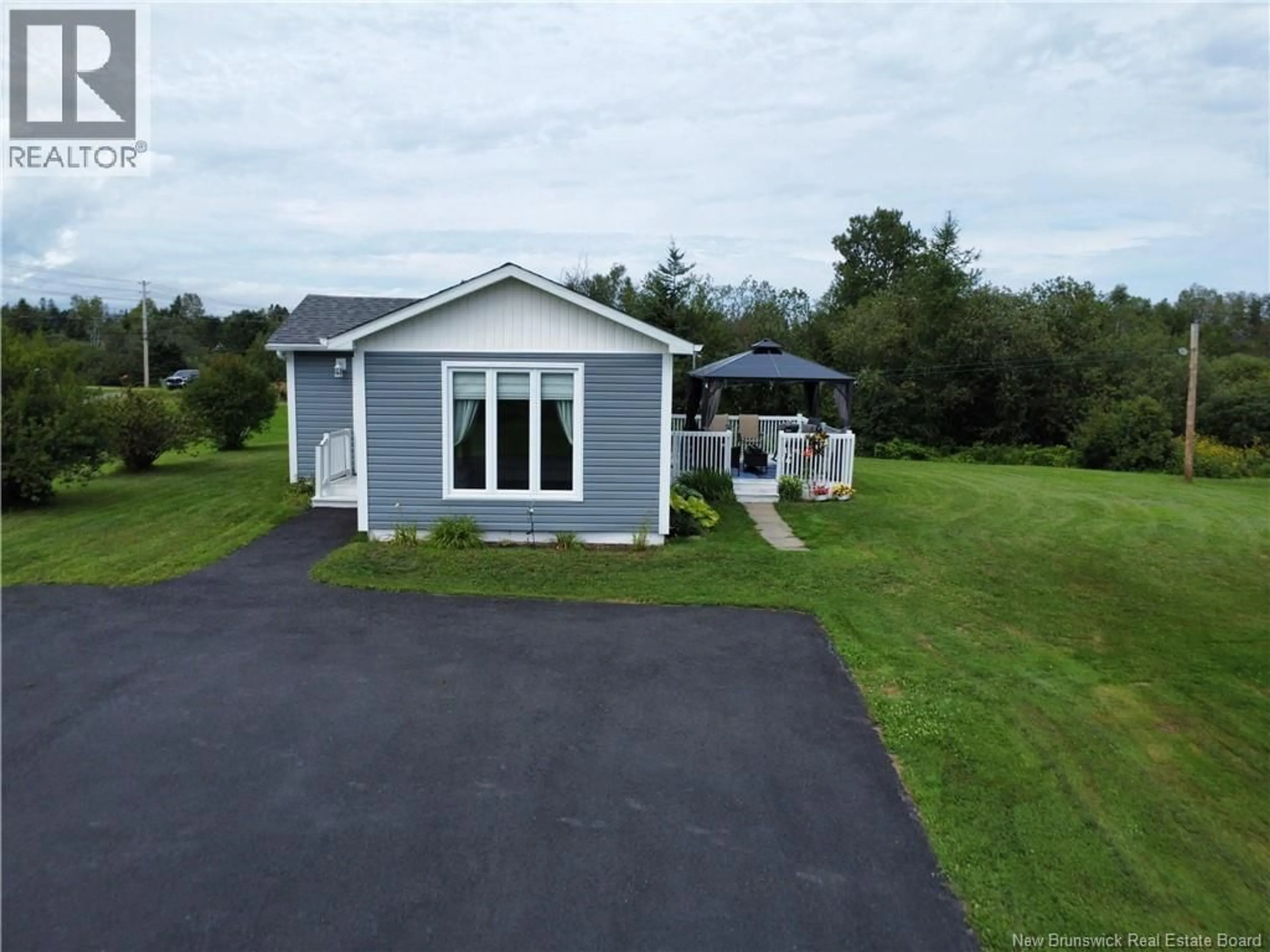 A pic from outside/outdoor area/front of a property/back of a property/a pic from drone, unknown for 1032 ROUTE 315, Dunlop New Brunswick E8K2M7