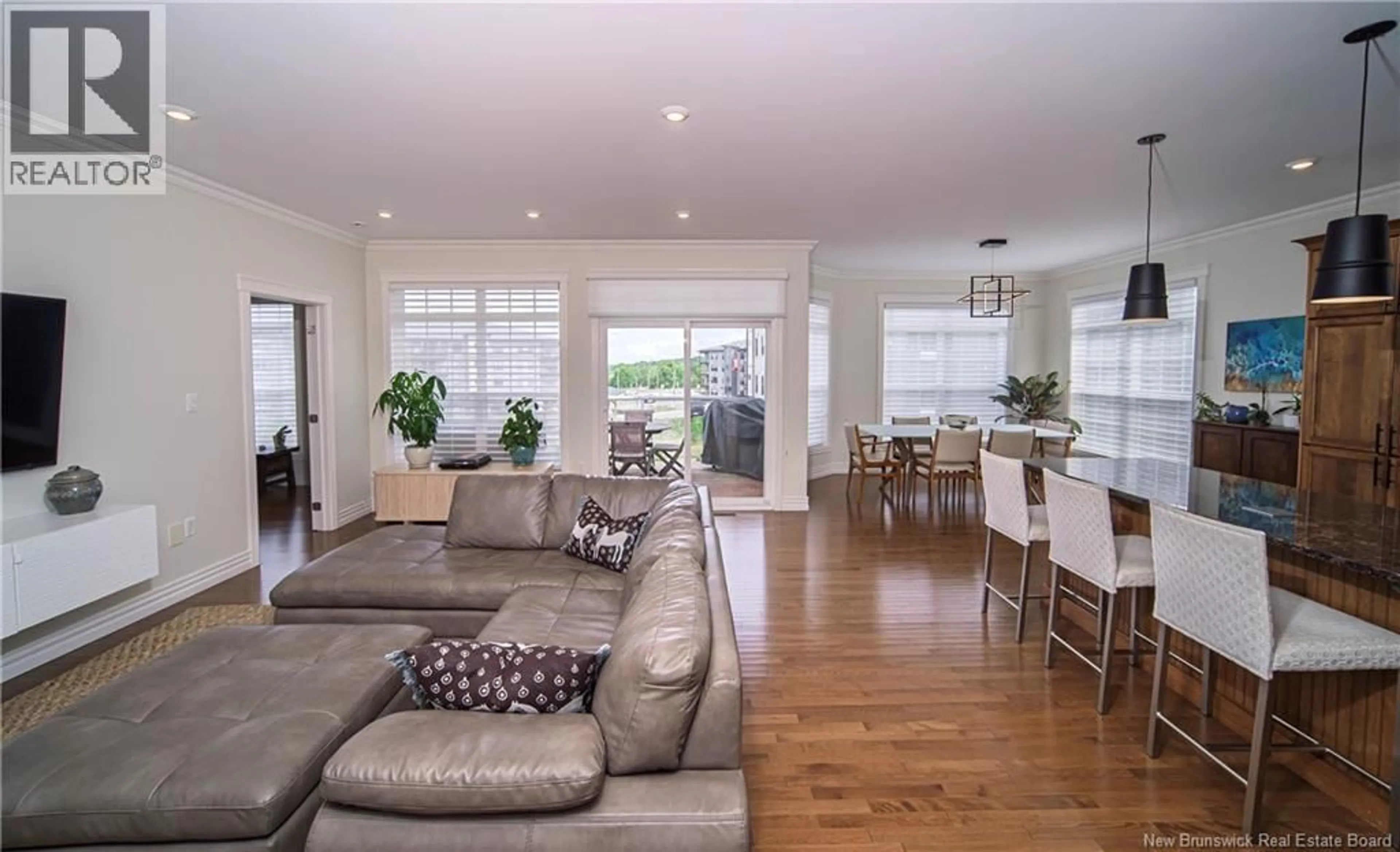 Living room with furniture, wood/laminate floor for 255 RAINSFORD LANE, Fredericton New Brunswick E3B7T1