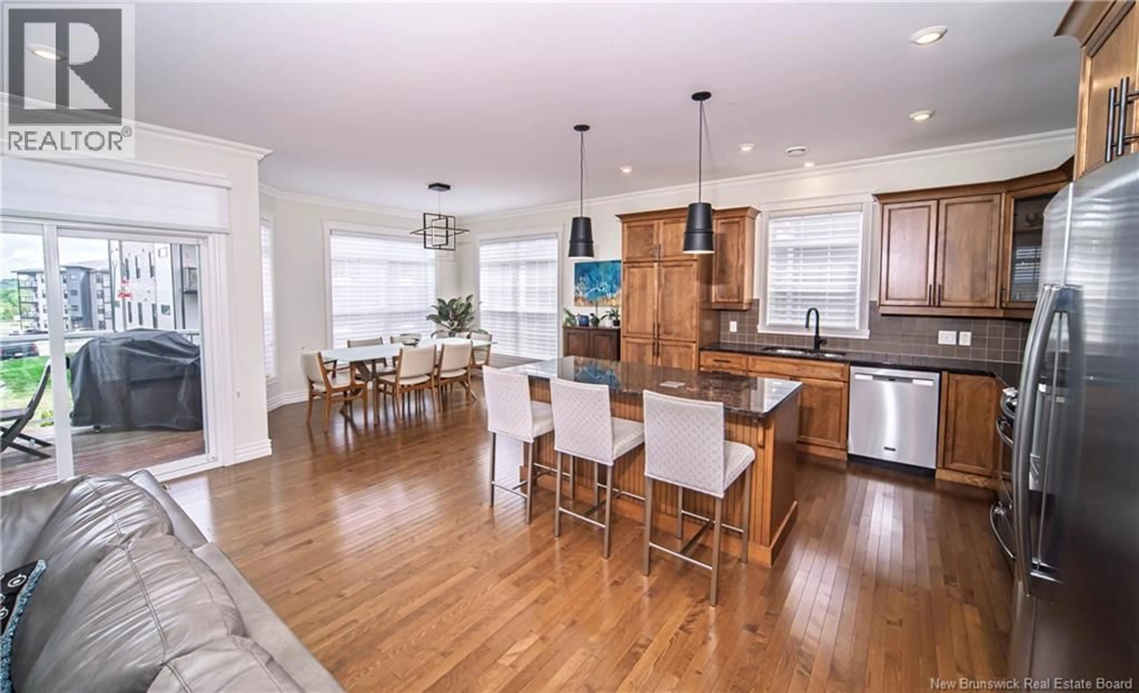 Open concept kitchen, wood/laminate floor for 255 RAINSFORD LANE, Fredericton New Brunswick E3B7T1