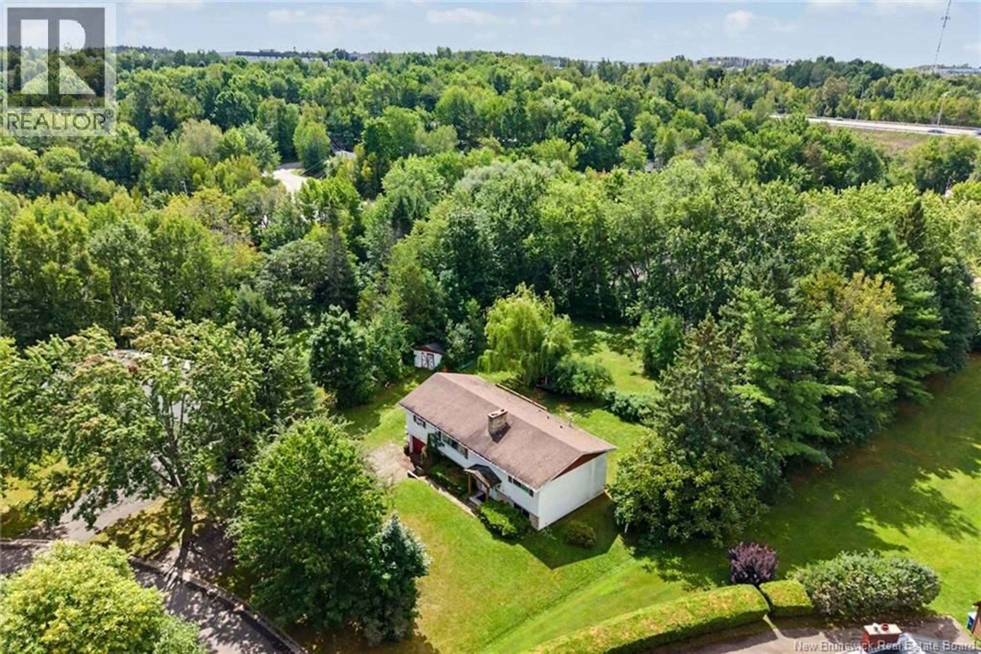 A pic from outside/outdoor area/front of a property/back of a property/a pic from drone, water/lake/river/ocean view for 719 GLENGARRY PLACE, Fredericton New Brunswick E3B5Z8