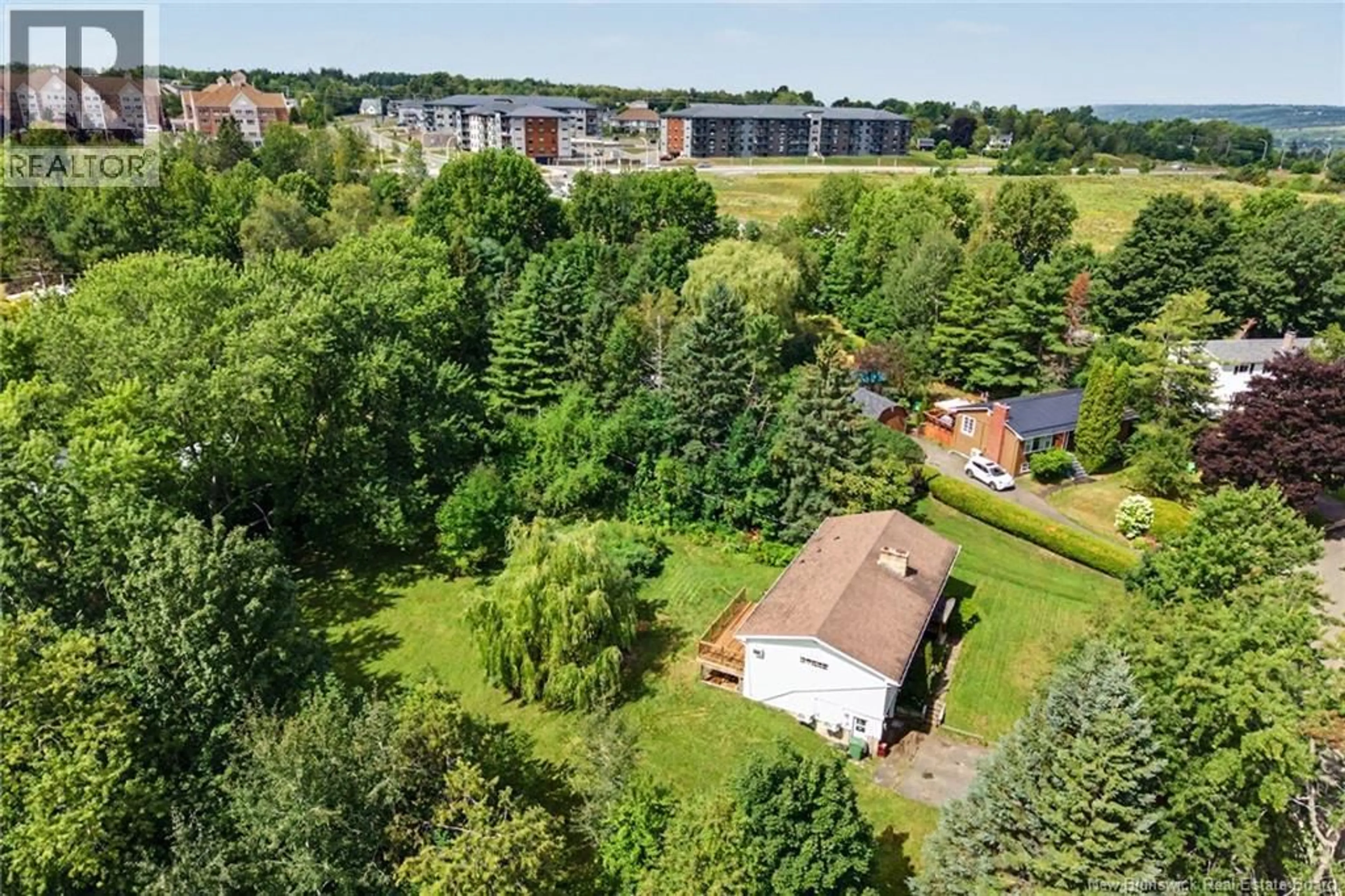 A pic from outside/outdoor area/front of a property/back of a property/a pic from drone, unknown for 719 GLENGARRY PLACE, Fredericton New Brunswick E3B5Z8